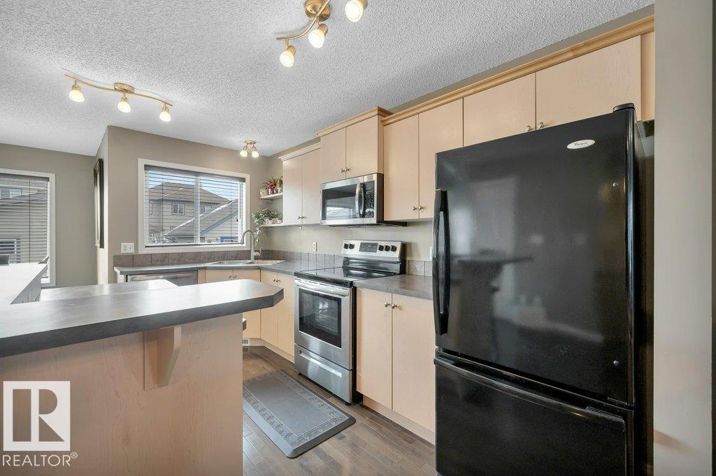 Photo 11 at 12063 19 Avenue SW, Rutherford, Edmonton