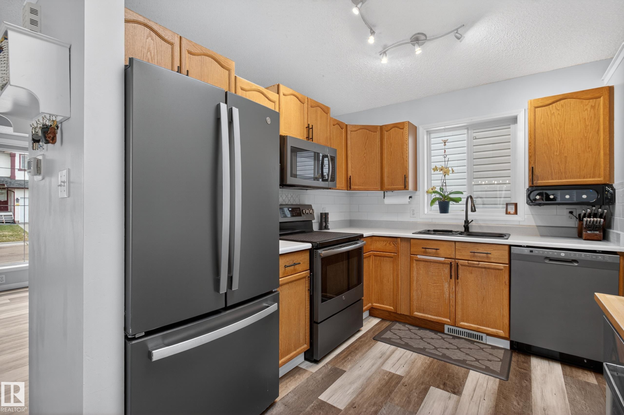 Photo 19 at 9119 166 Avenue NW, Eaux Claires, Edmonton