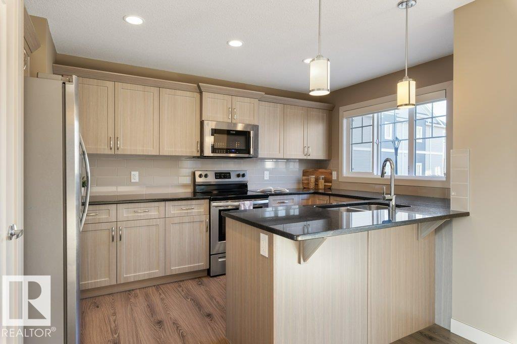 Photo 12 at 6 - 1391 Starling Drive NW, Starling, Edmonton