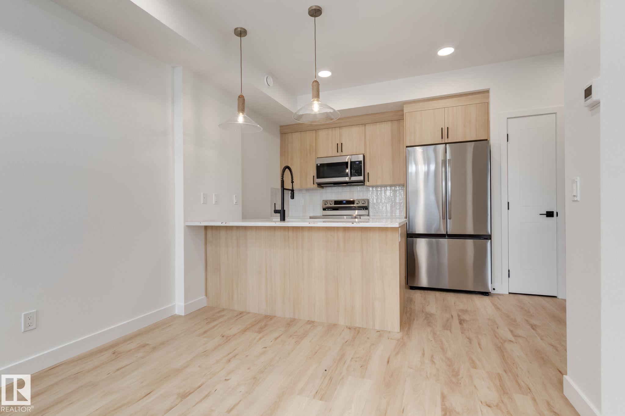 Photo 6 at 42 - 16231 19 Avenue SW, Glenridding Ravine, Edmonton