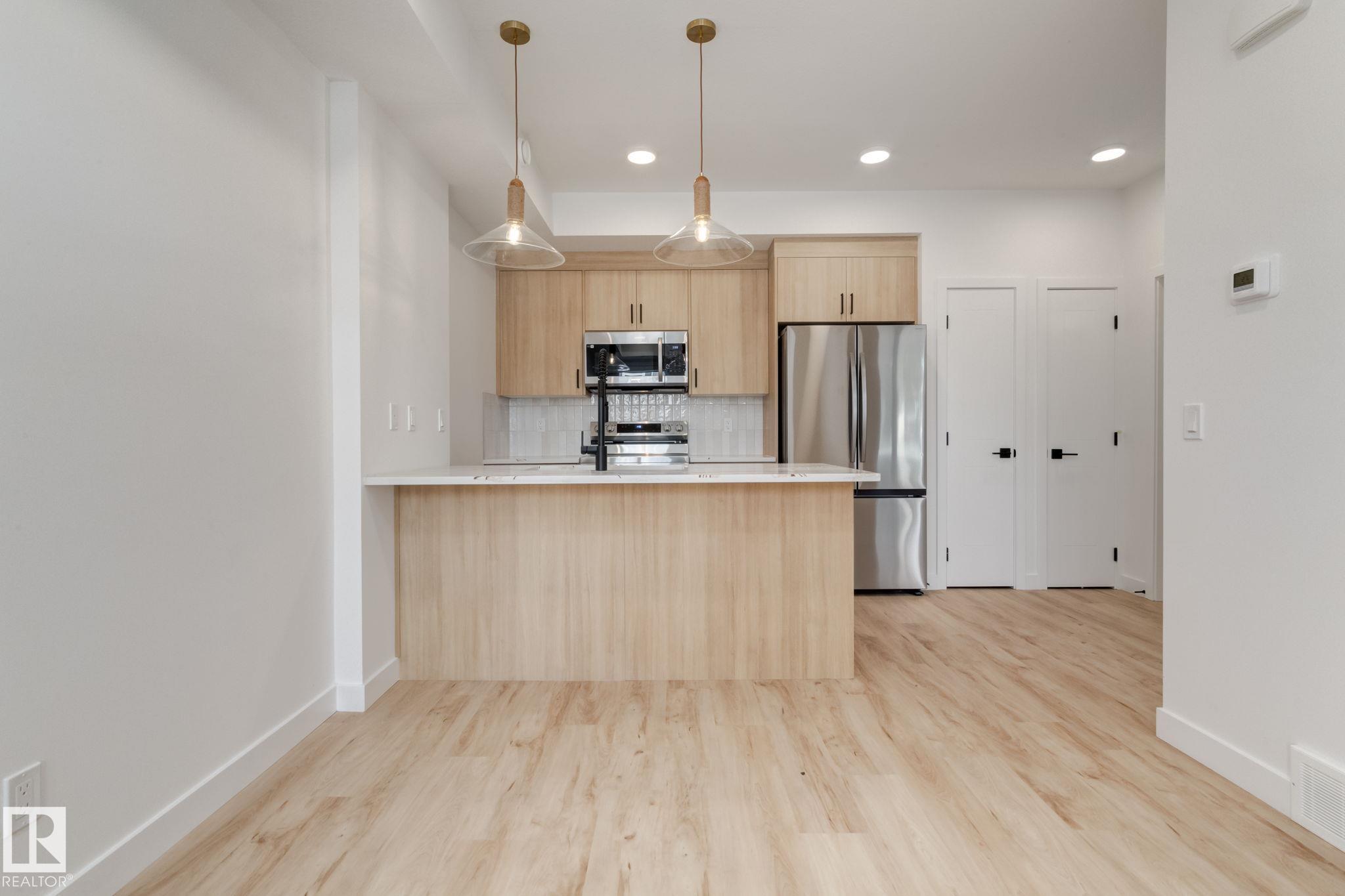 Photo 7 at 42 - 16231 19 Avenue SW, Glenridding Ravine, Edmonton