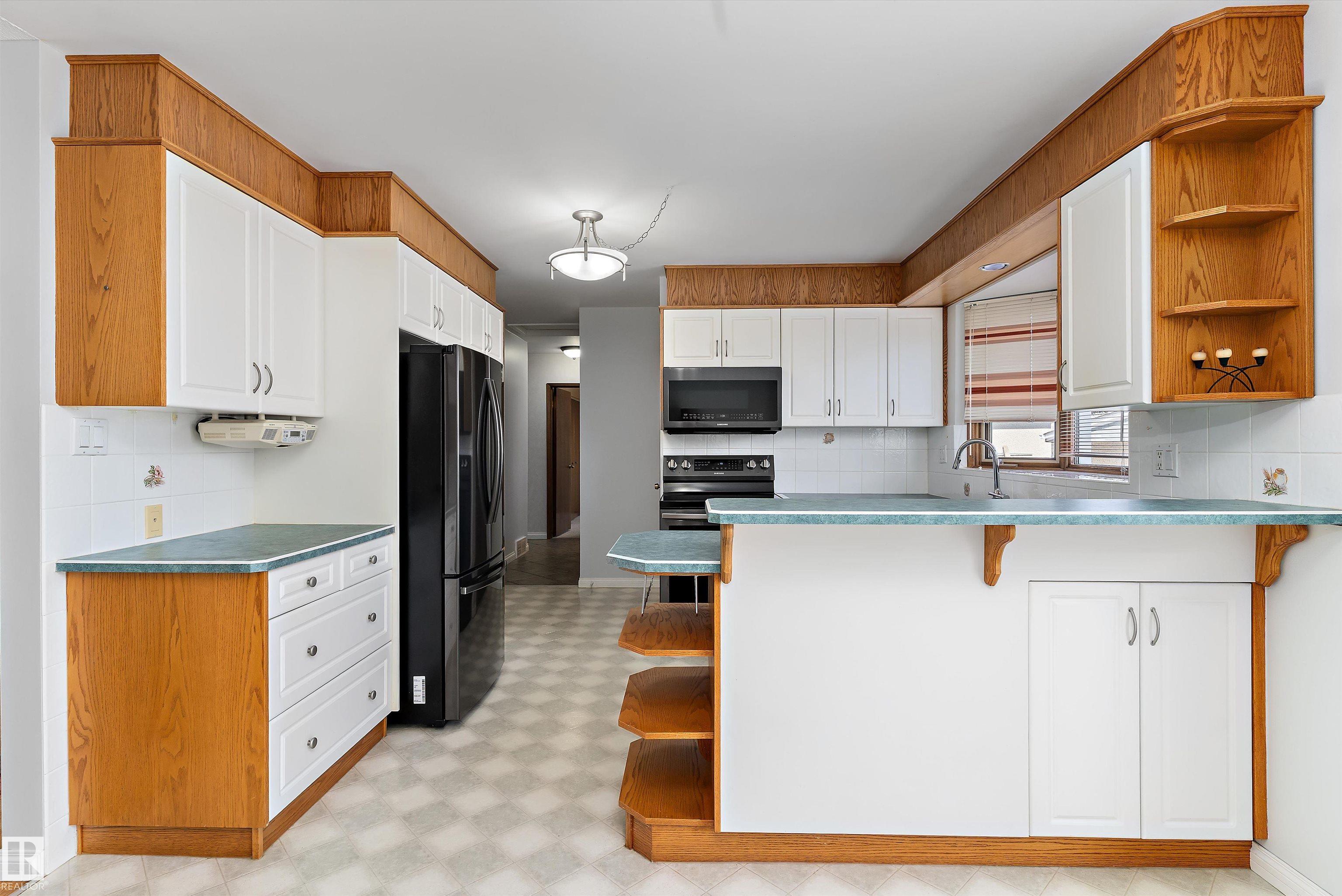 Photo 17 at 9411 68a Street NW, Ottewell, Edmonton