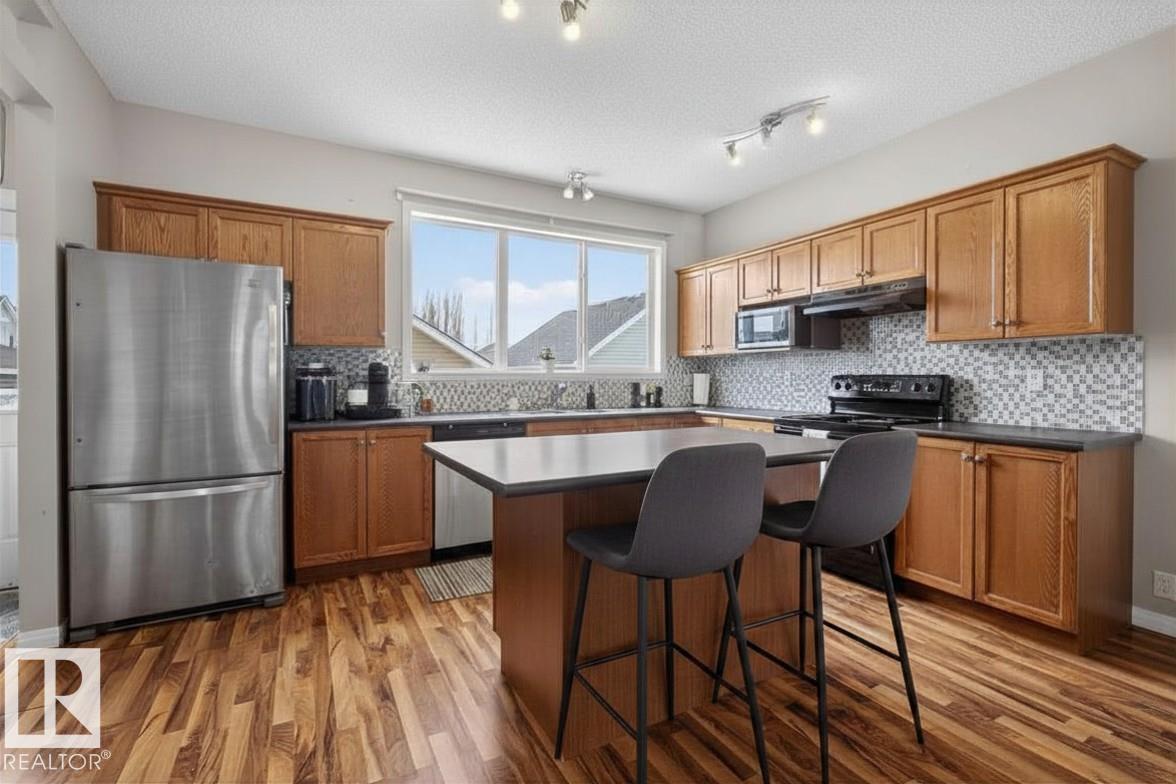 Photo 9 at 7704 16 Avenue SW, Summerside, Edmonton