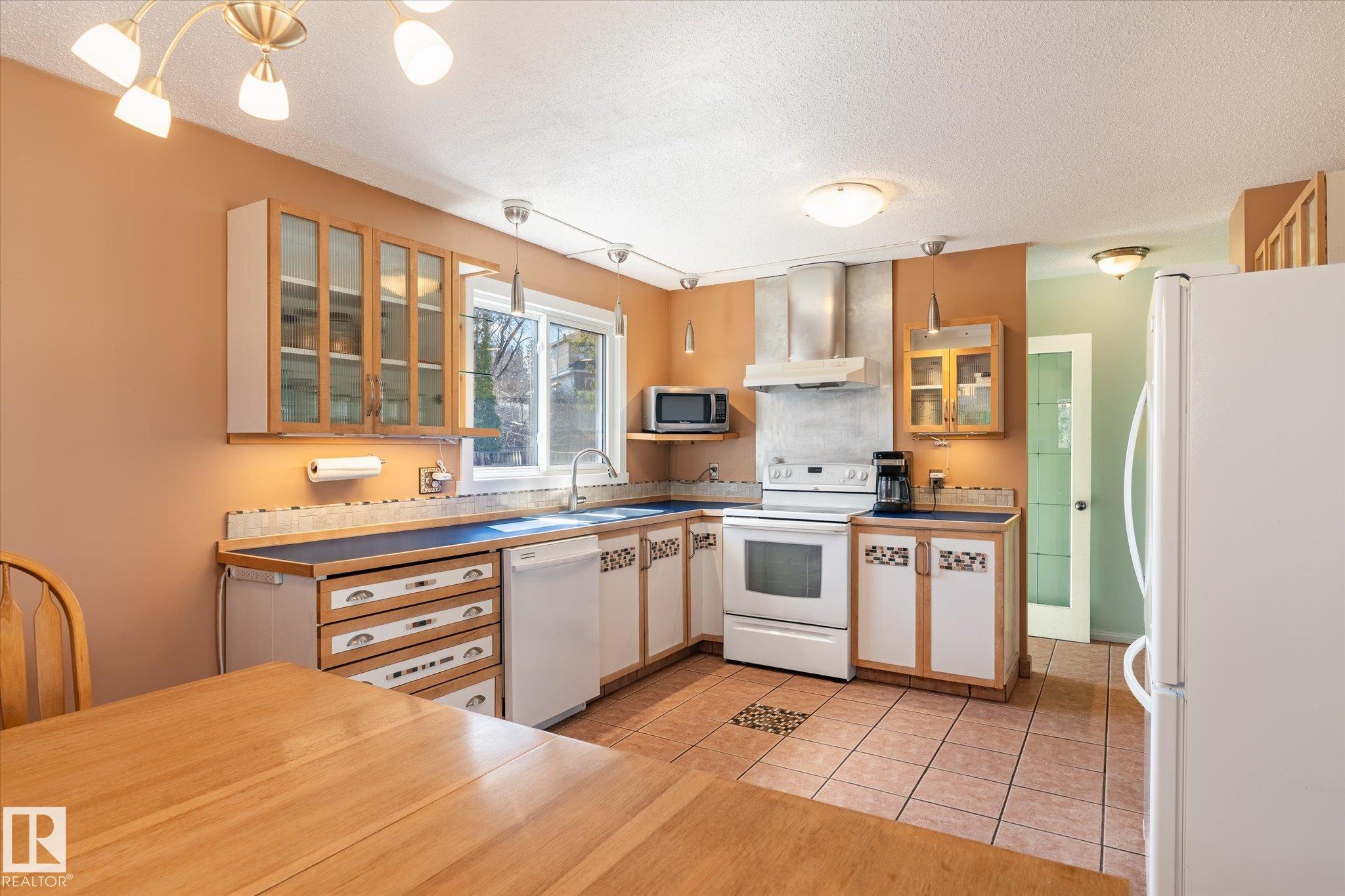 Photo 9 at 30 Farmstead Avenue, Forest Lawn, St. Albert