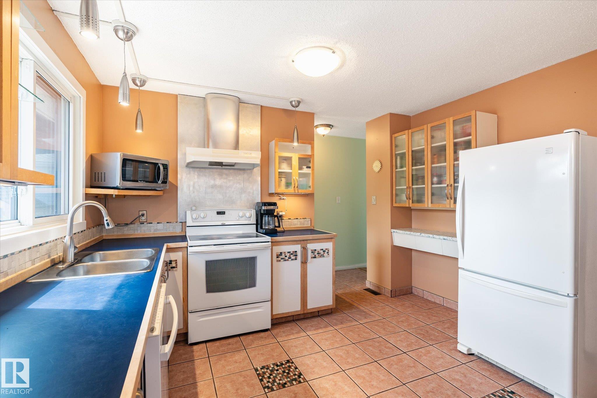 Photo 10 at 30 Farmstead Avenue, Forest Lawn, St. Albert