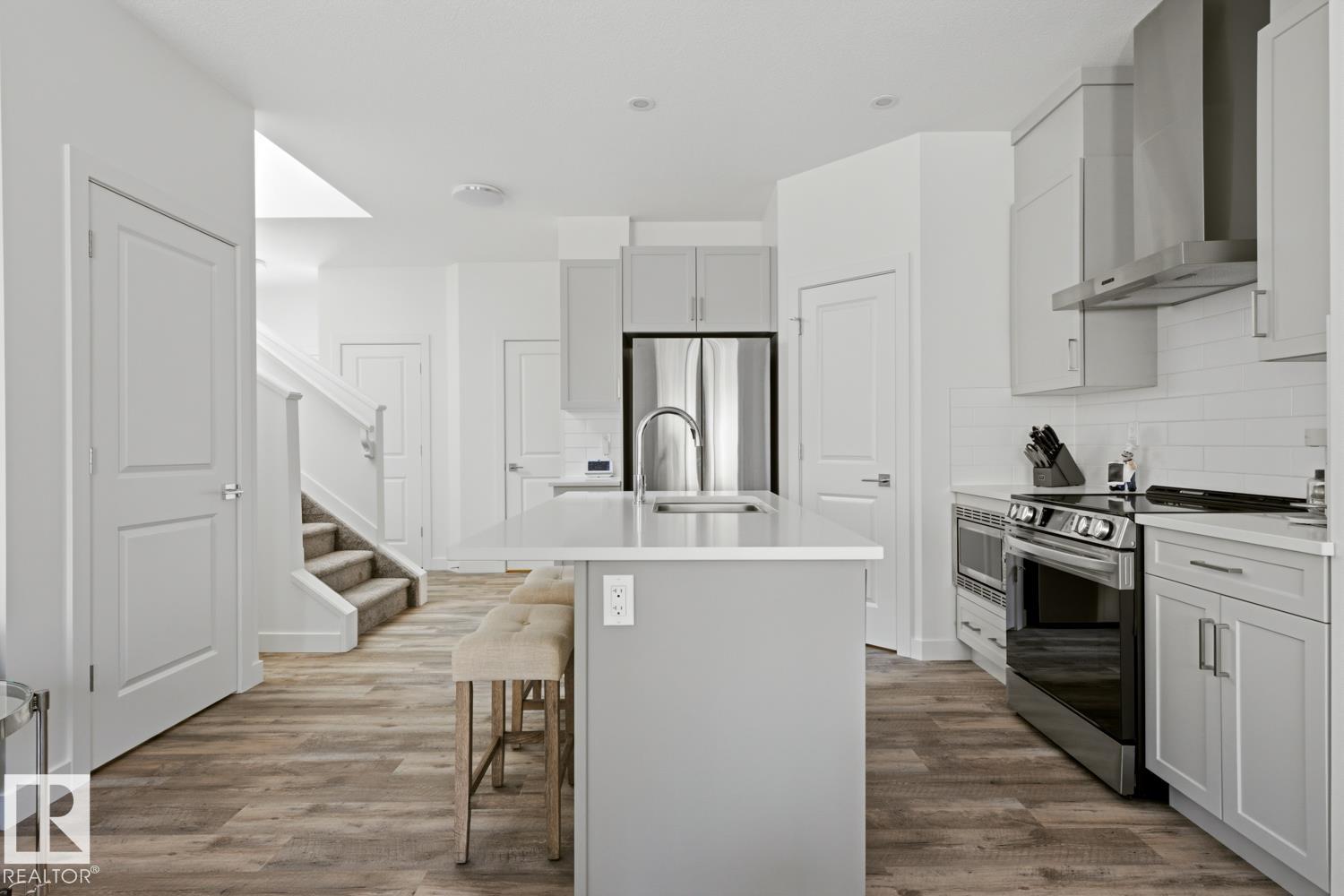 Photo 19 at 19 - 5122 213a Street NW, The Hamptons, Edmonton