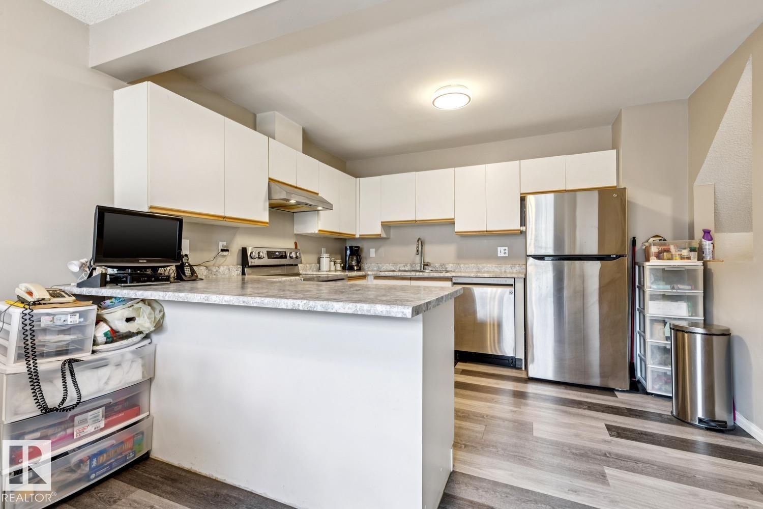 Photo 11 at 40 - 9520 174 Street NW, Terra Losa, Edmonton