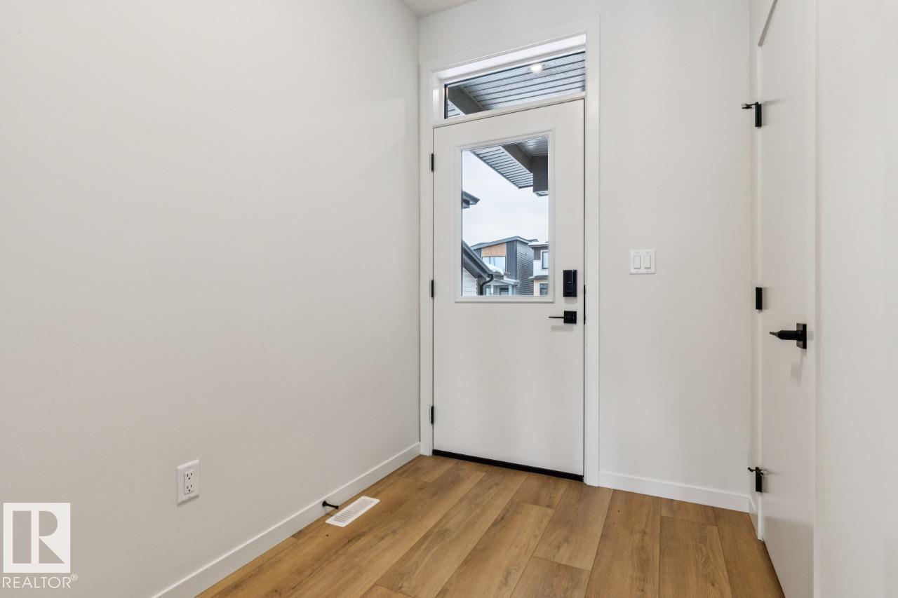 Photo 3 at 404 30 Street SW, Alces, Edmonton