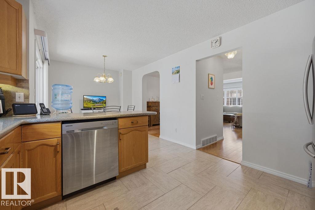Photo 12 at 17624 96 Avenue NW, Terra Losa, Edmonton