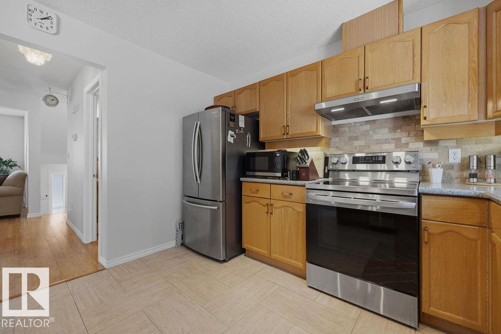 Photo 13 at 17624 96 Avenue NW, Terra Losa, Edmonton