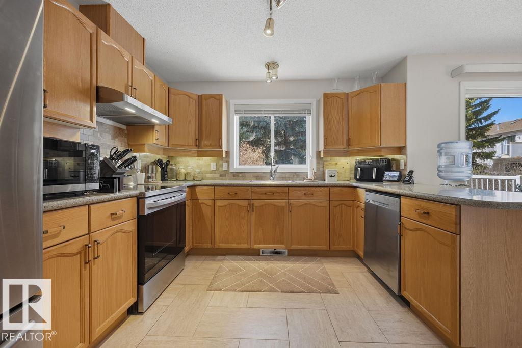 Photo 14 at 17624 96 Avenue NW, Terra Losa, Edmonton