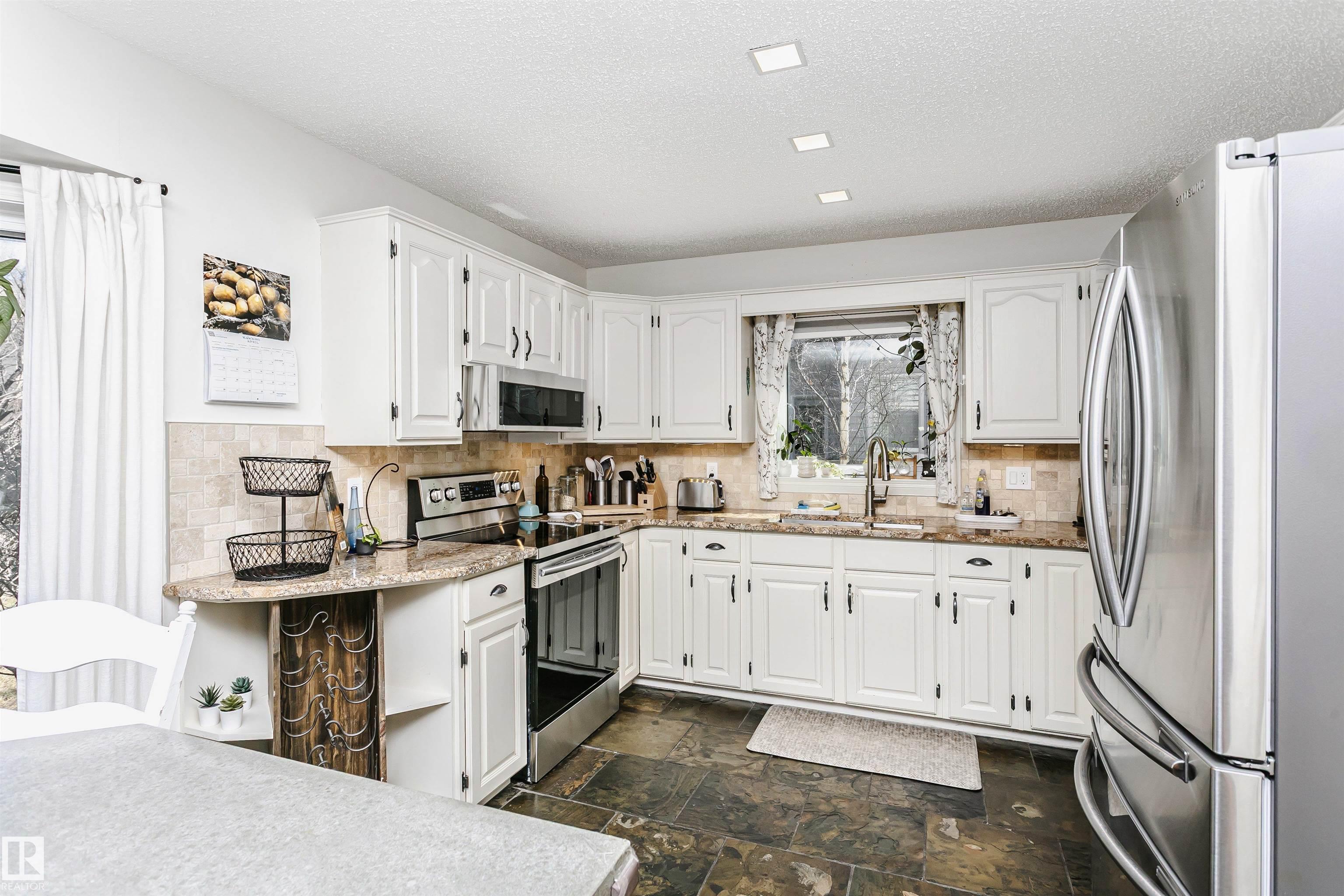 Photo 15 at 17820 57 Avenue NW, Dechene, Edmonton