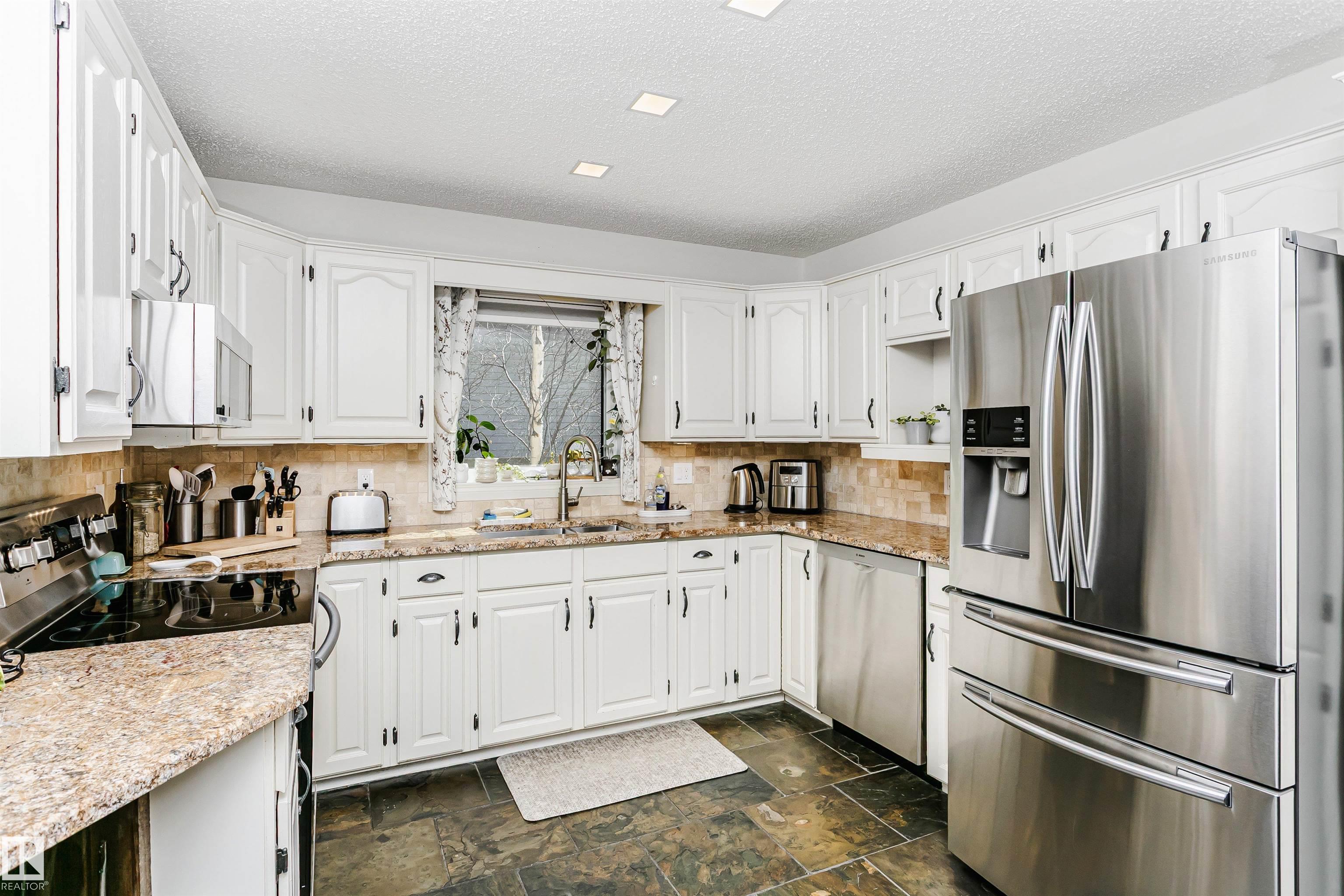 Photo 16 at 17820 57 Avenue NW, Dechene, Edmonton
