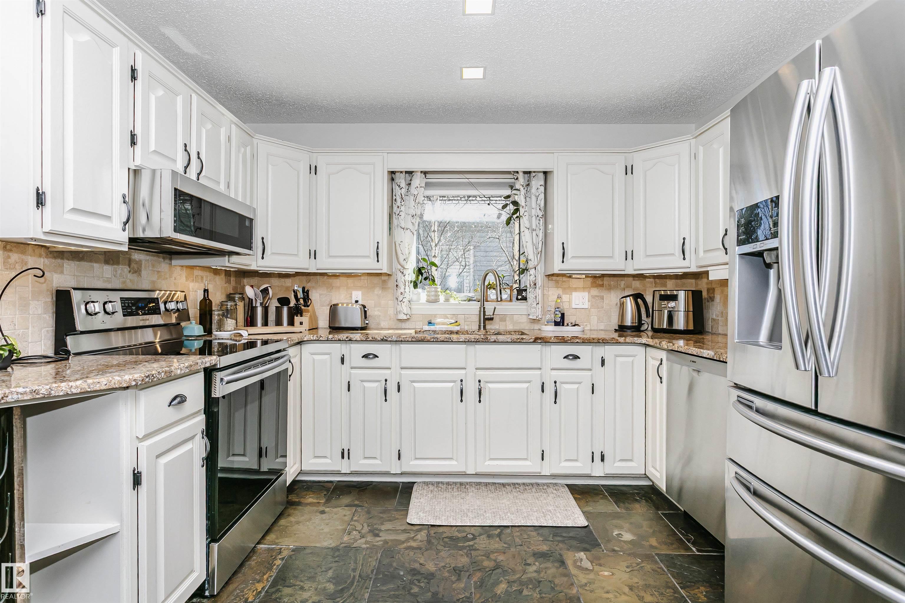 Photo 18 at 17820 57 Avenue NW, Dechene, Edmonton