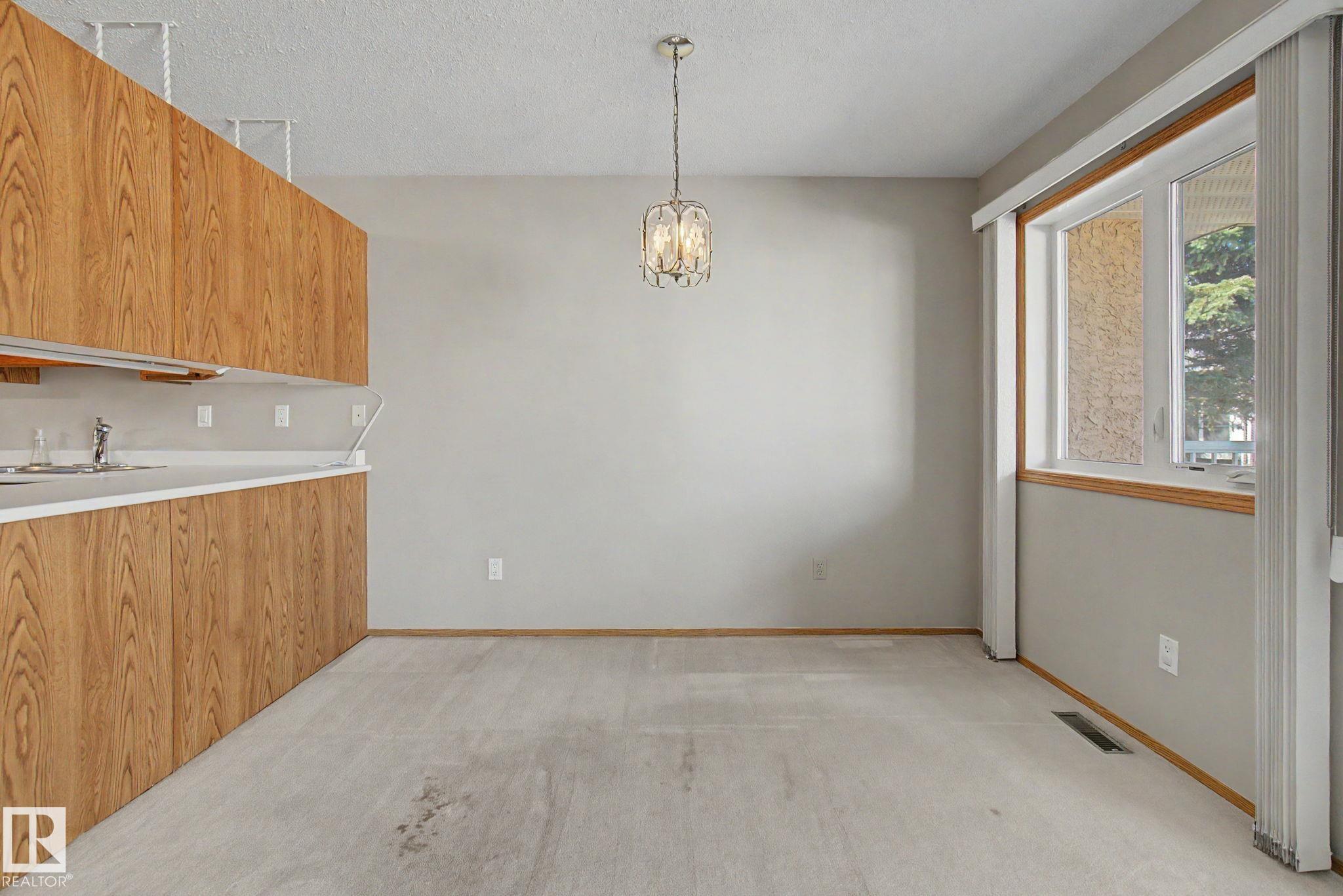 Photo 16 at 17434 Callingwood Road NW, Callingwood South, Edmonton