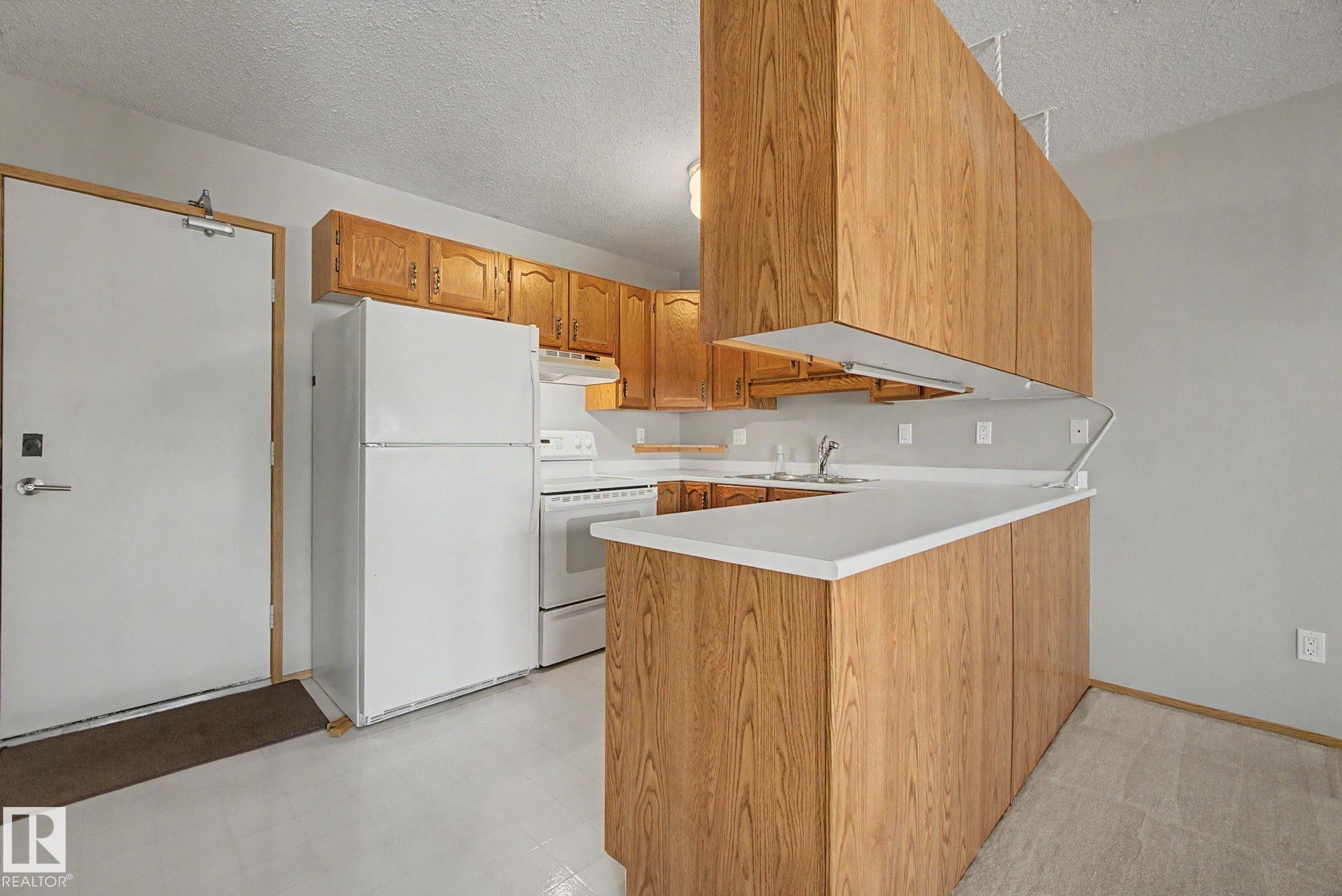 Photo 18 at 17434 Callingwood Road NW, Callingwood South, Edmonton