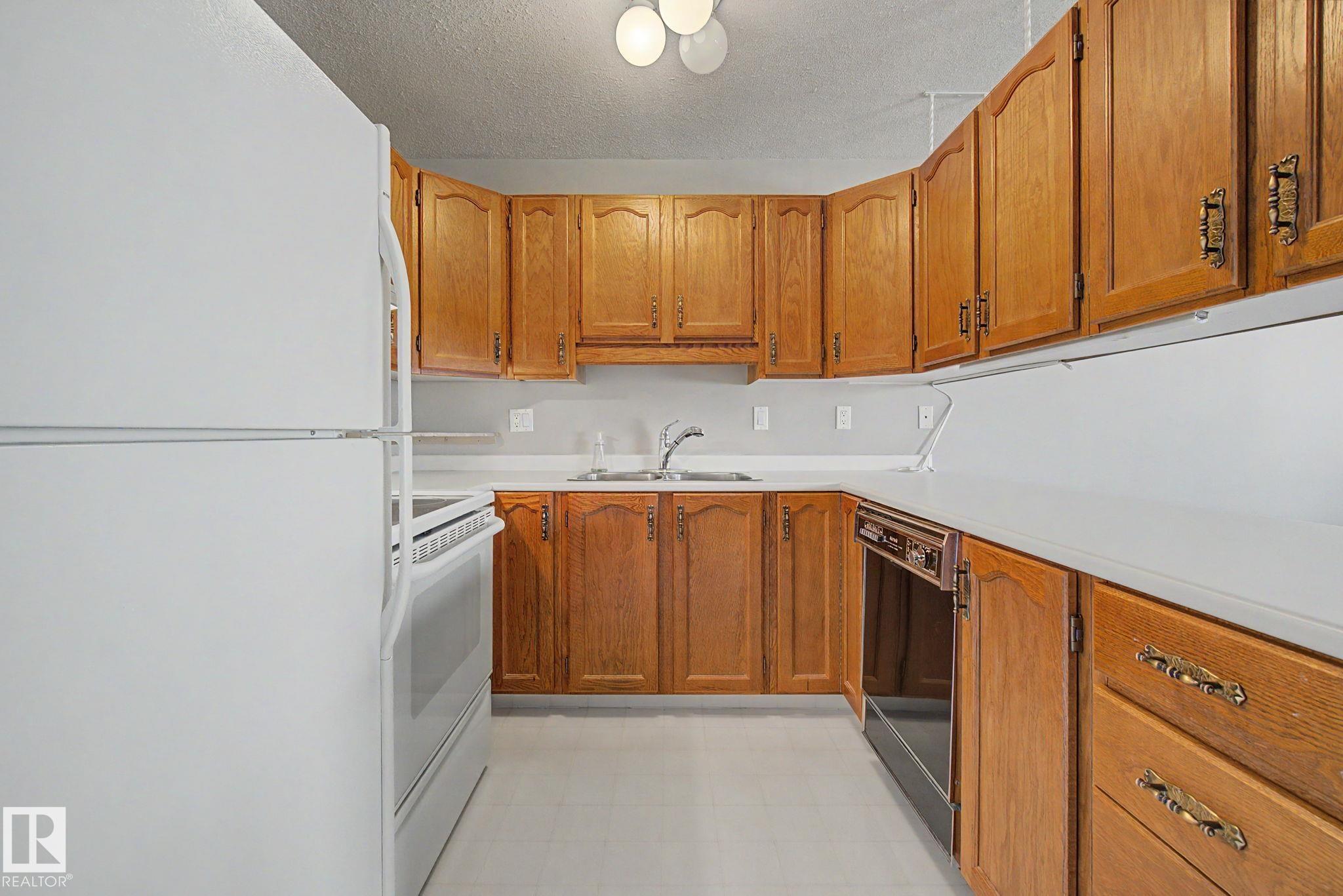 Photo 19 at 17434 Callingwood Road NW, Callingwood South, Edmonton