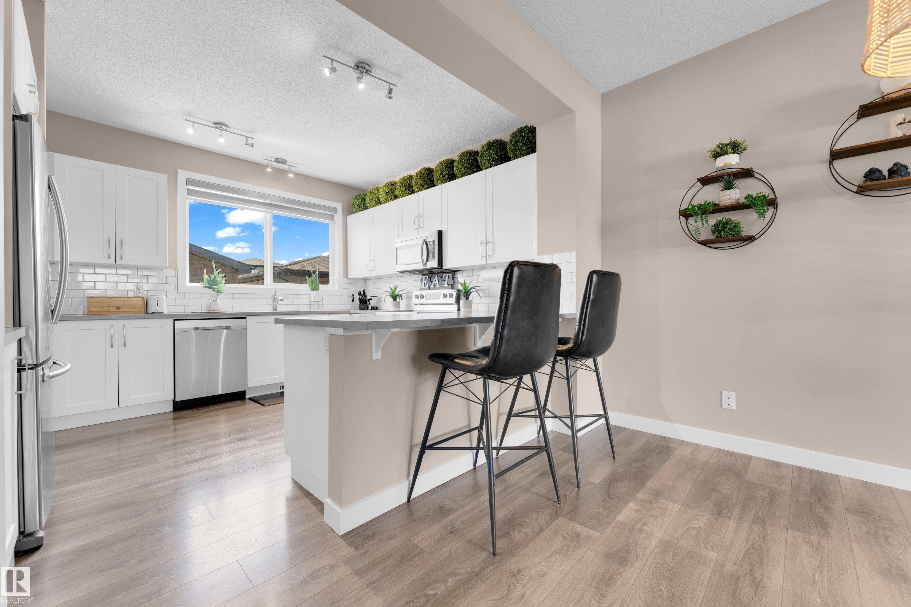 Photo 10 at 725 36 Street SW, Charlesworth, Edmonton