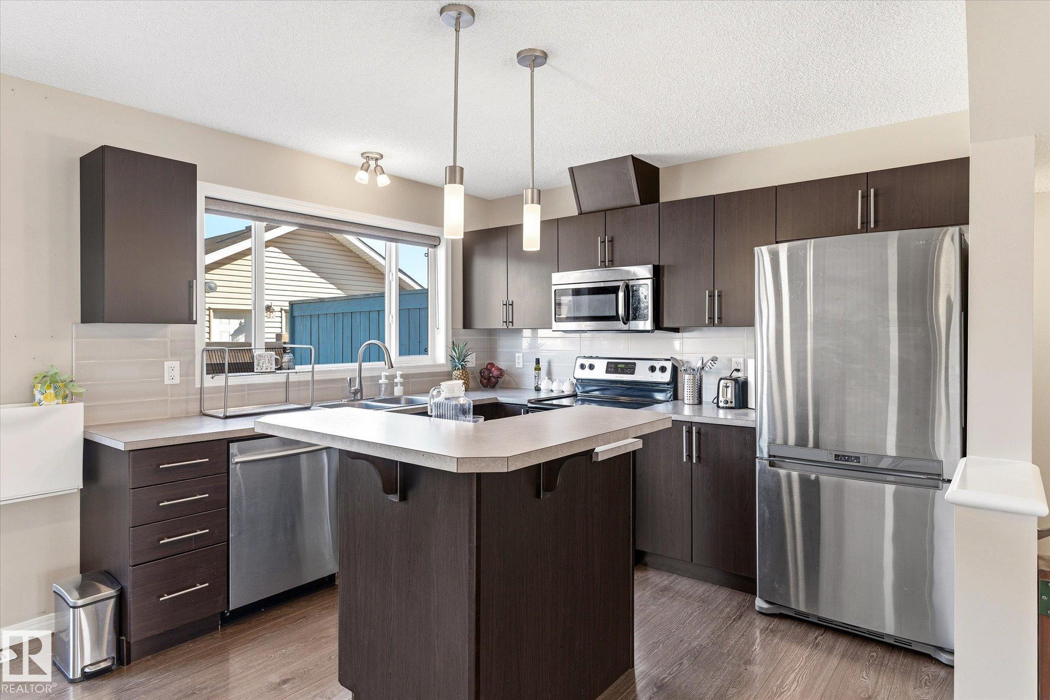 Photo 17 at 7114 22 Avenue SW, Summerside, Edmonton