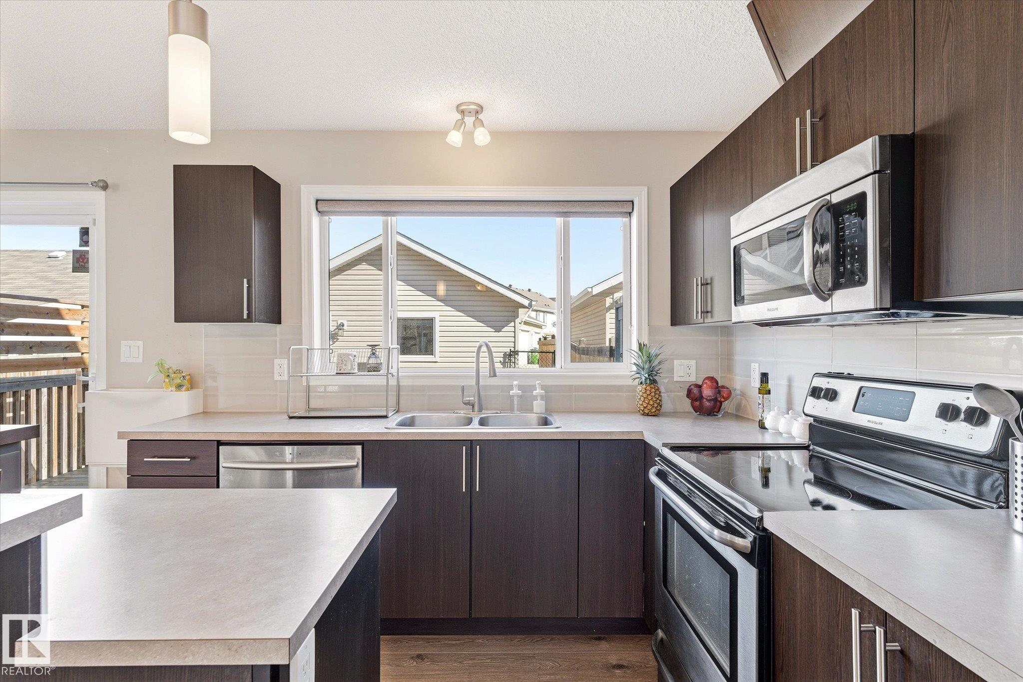 Photo 19 at 7114 22 Avenue SW, Summerside, Edmonton