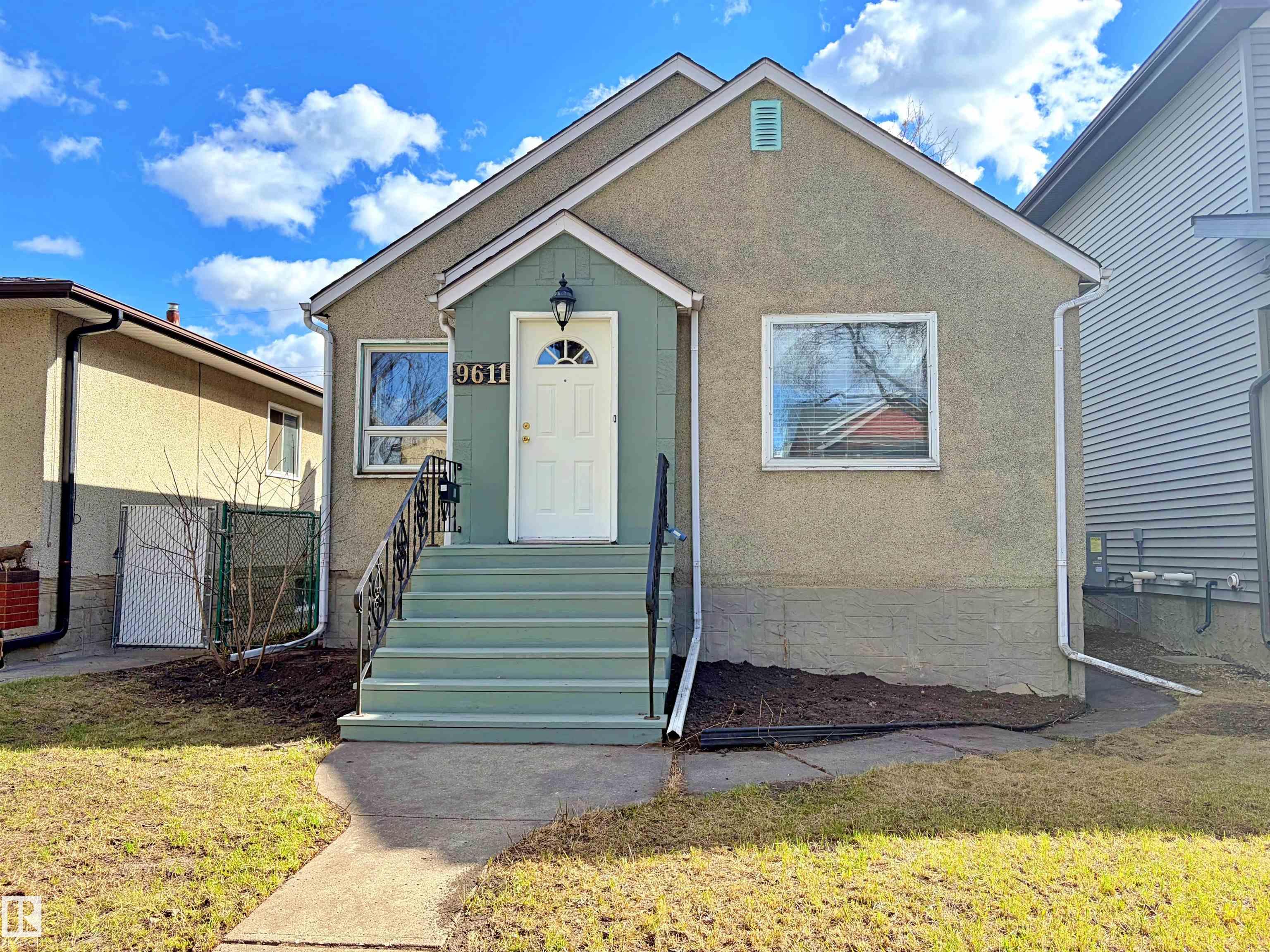 Attention homeowners, rental investors or even developers. Situated on a beautiful tree-canopied street in one of Edmontons most sought after communities of Ritchie. Within a few steps of Millcreek ravine/ pool, Ritchie market restaurants & coffee shops, and the high vibe of Whyte ave. This bright 3 bedroom bungalow w/ basement suite, has been fully renovated while maintaining its cozy character & charm. Some renovations include new paint throughout, gleaming hardwood floors, quartz counters with single bowl multifunction sink, & an expanded luxurious jacuzzi bath with original chandeliers. The spacious separate entrance 1 bedroom suite has common laundry, a large eat-in kitchen, a relaxing steam shower and huge walk in closet (which could be used as a 2nd bedroom). There is a fully fenced yard, with apple tree and a double detached garage w/ new overhead door. Live on the main floor, rent out before redeveloping or add a garage suite. The options are plentiful with this lovely home/investment. Dont miss!