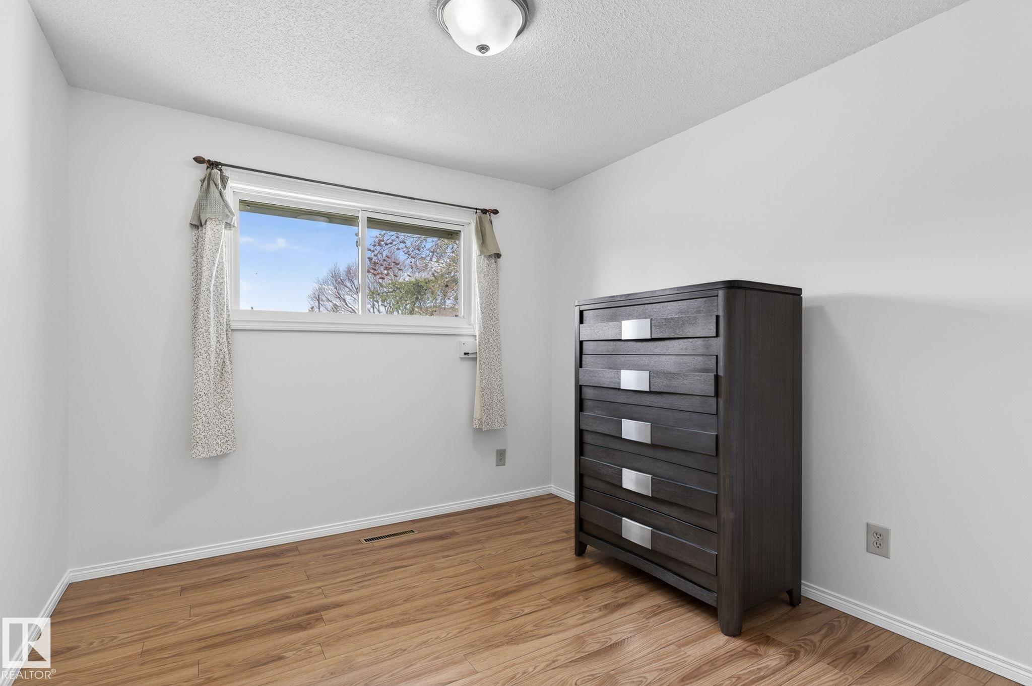 Photo 16 at 10719 152 Street NW, High Park, Edmonton