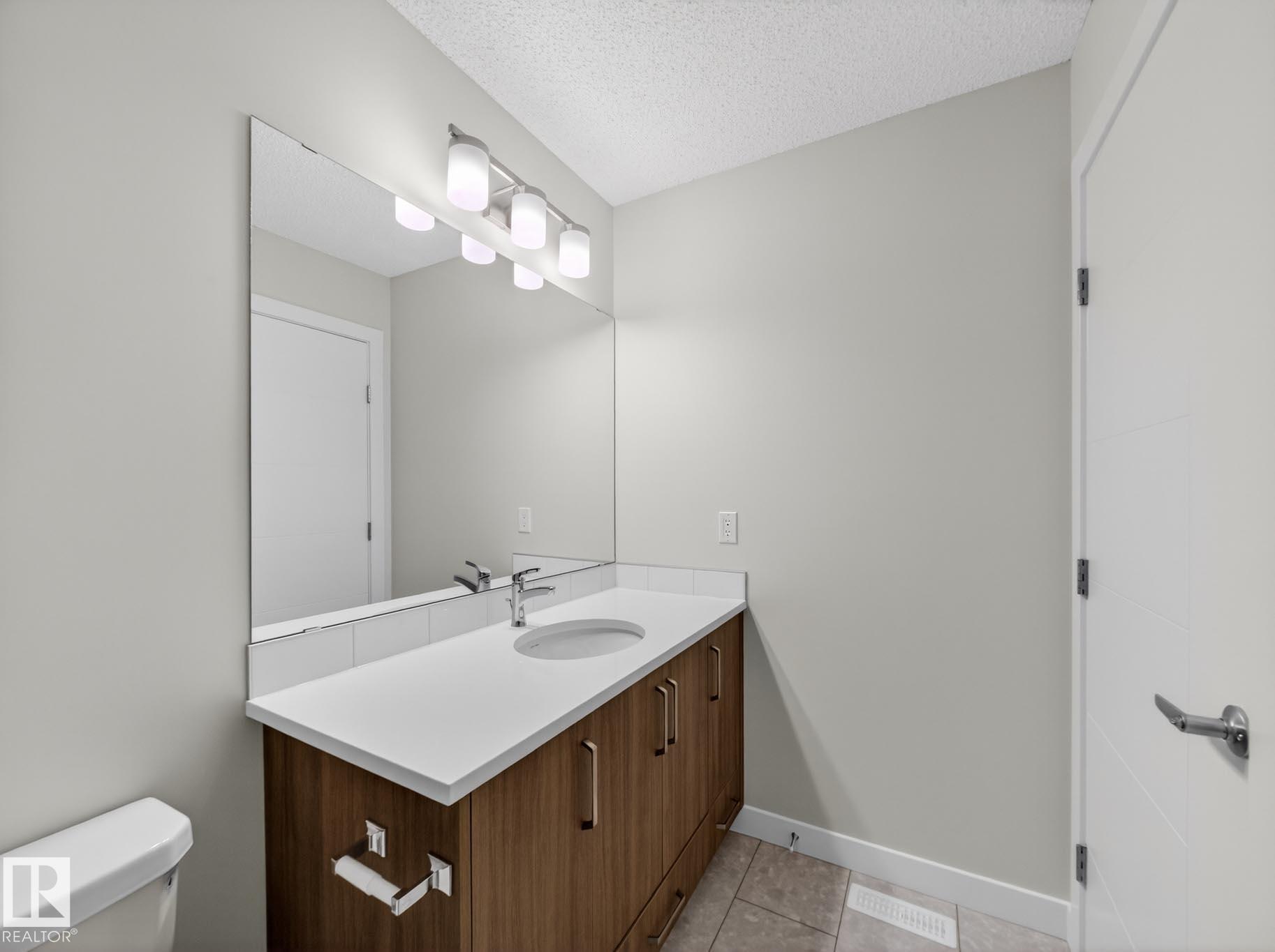 Photo 33 at 301 Brae Way, Black Stone, Leduc