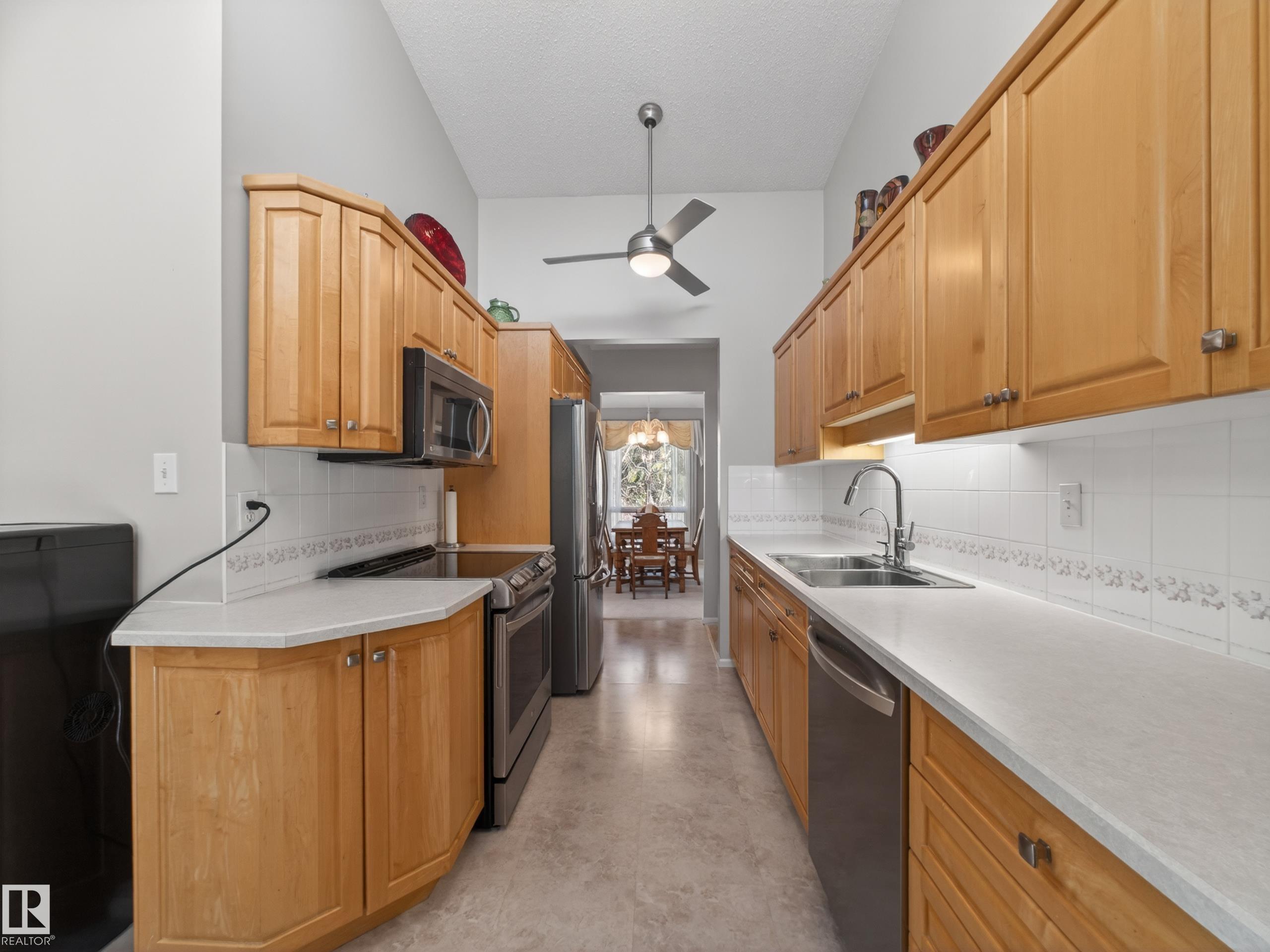 Photo 10 at 109 - 53279 Rge Road 225, Tidan Heights, Rural Strathcona County