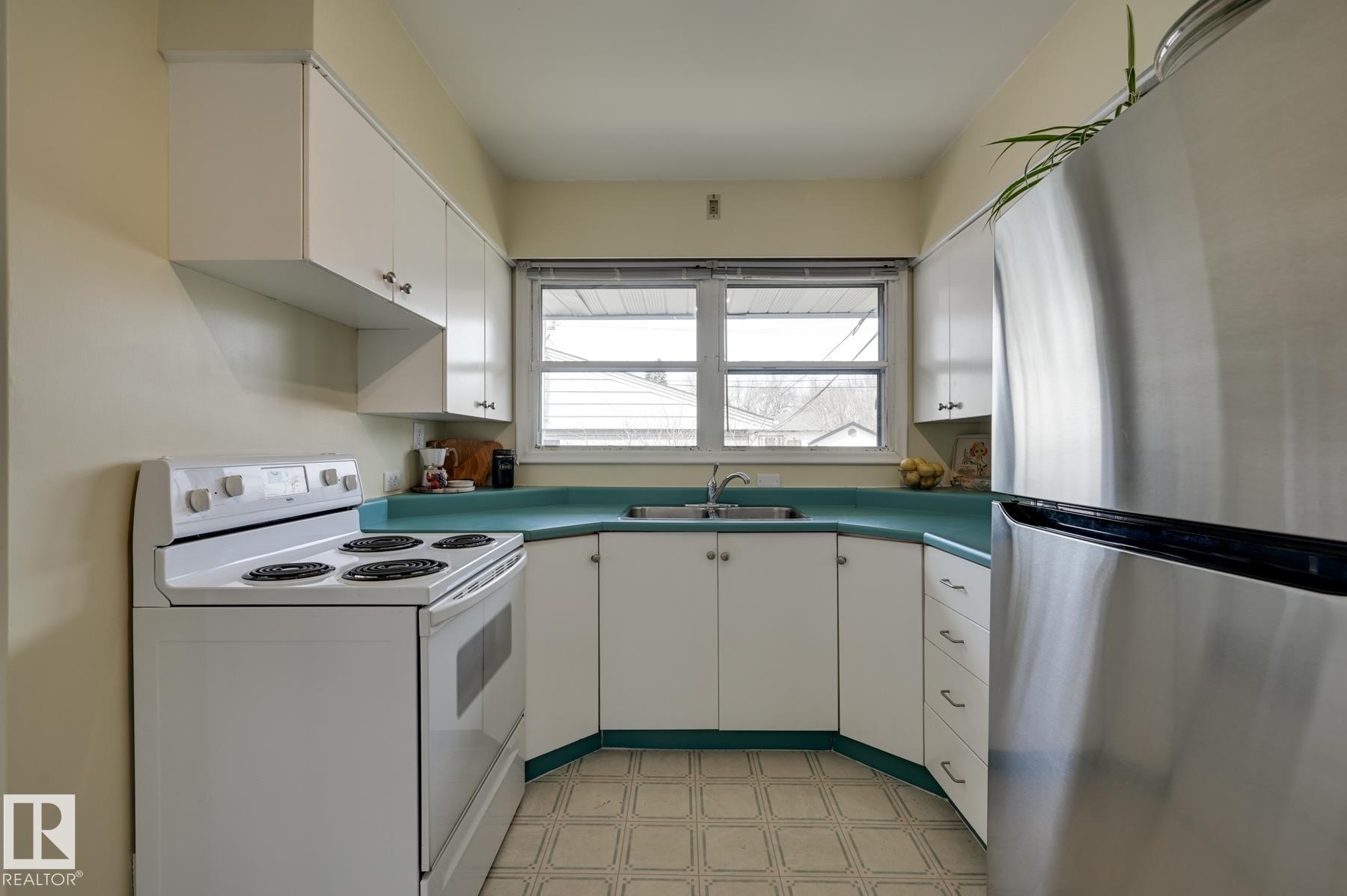 Photo 11 at 14552 107a Avenue NW, McQueen, Edmonton