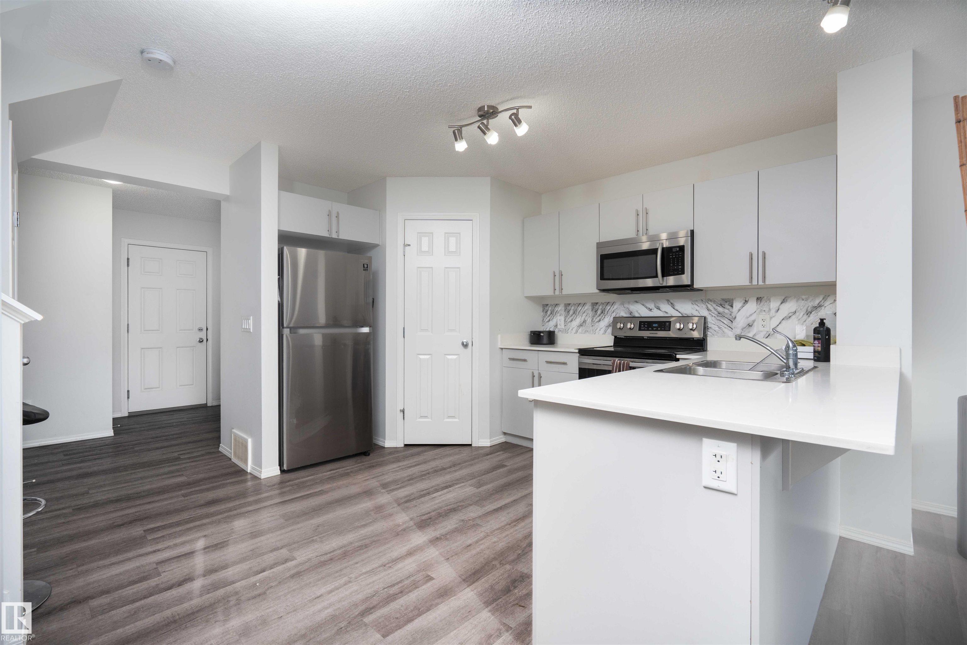 Photo 7 at 3099 Checknita Way SW, Cavanagh, Edmonton
