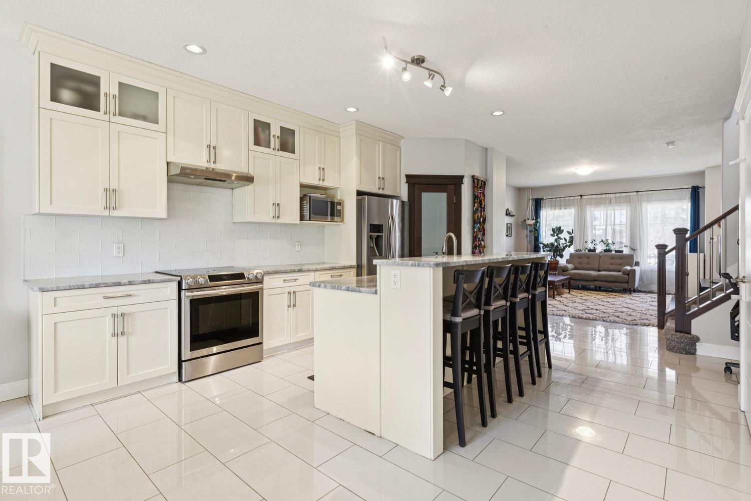 Photo 11 at 9919 79 Street NW, Forest Heights, Edmonton