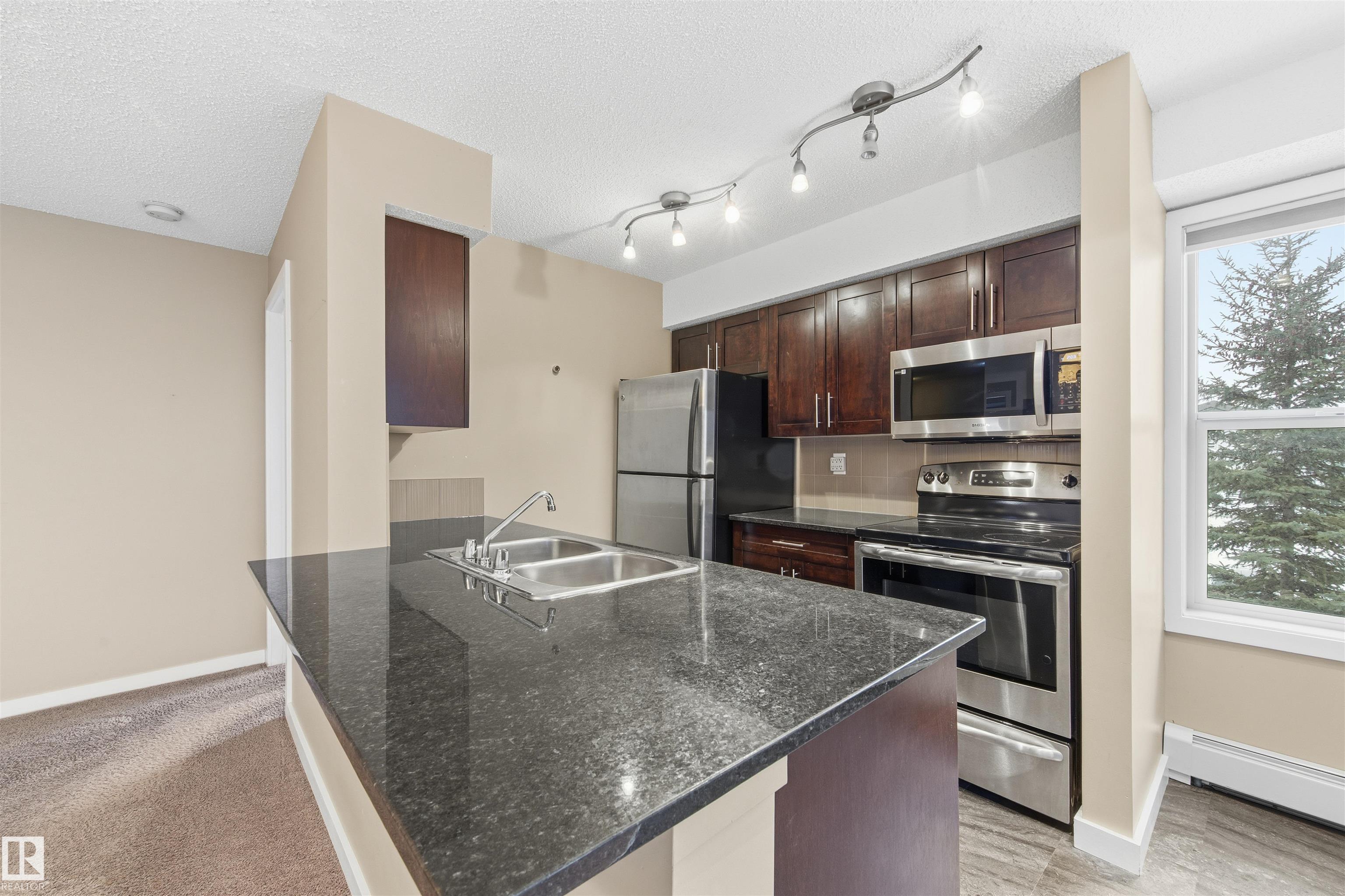 Photo 12 at 221 - 1070 Mcconachie Boulevard NW, McConachie Area, Edmonton