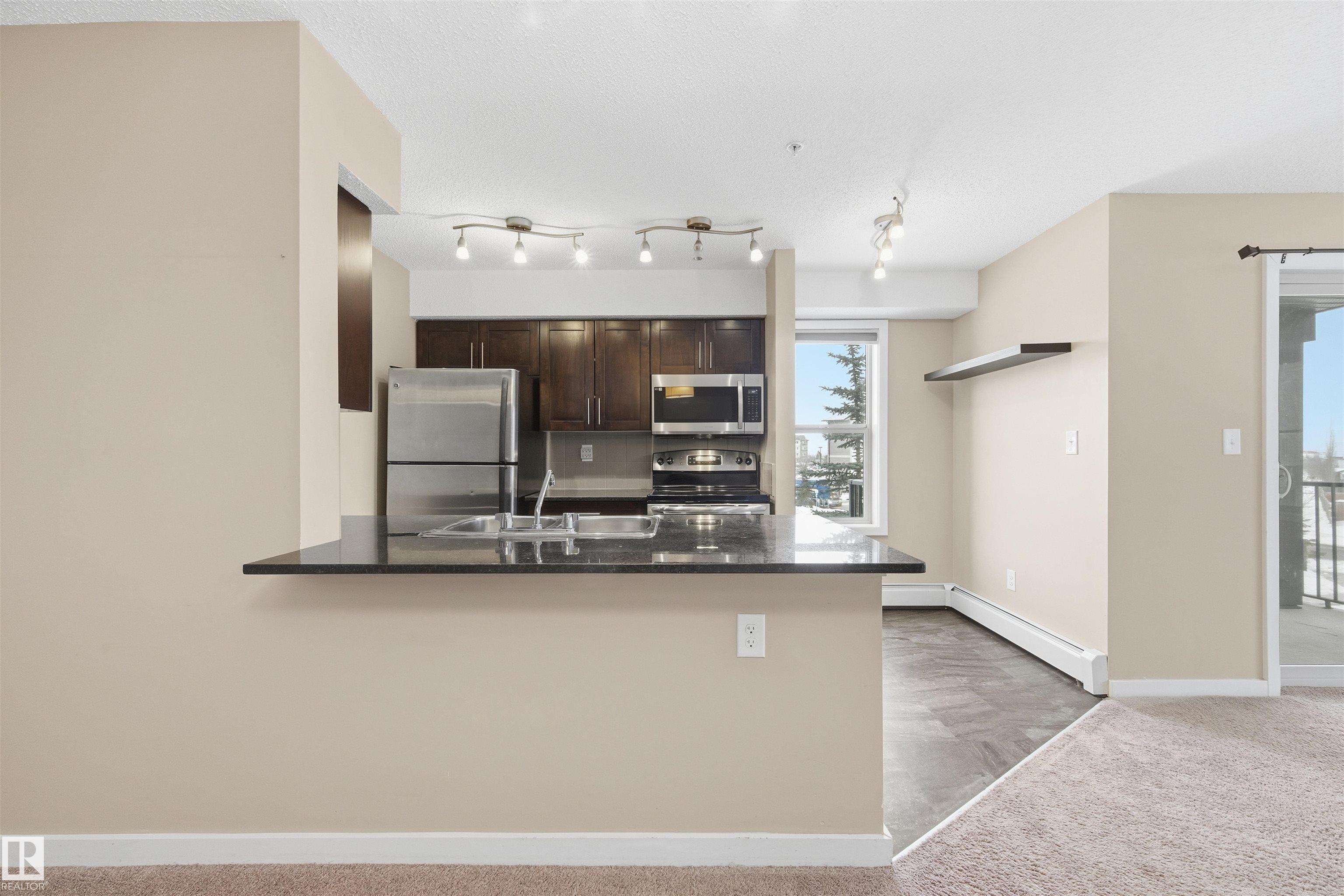 Photo 7 at 221 - 1070 Mcconachie Boulevard NW, McConachie Area, Edmonton