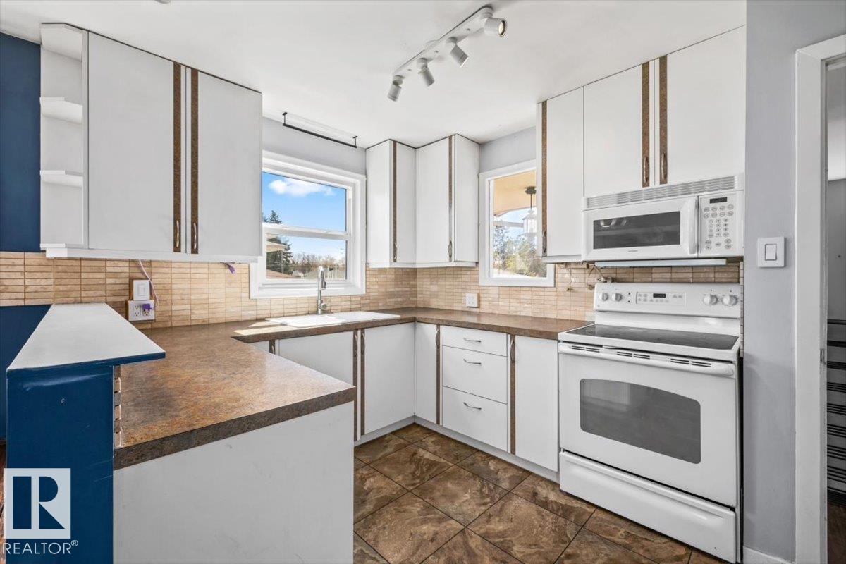 Photo 11 at 9828 79 Street NW, Forest Heights, Edmonton