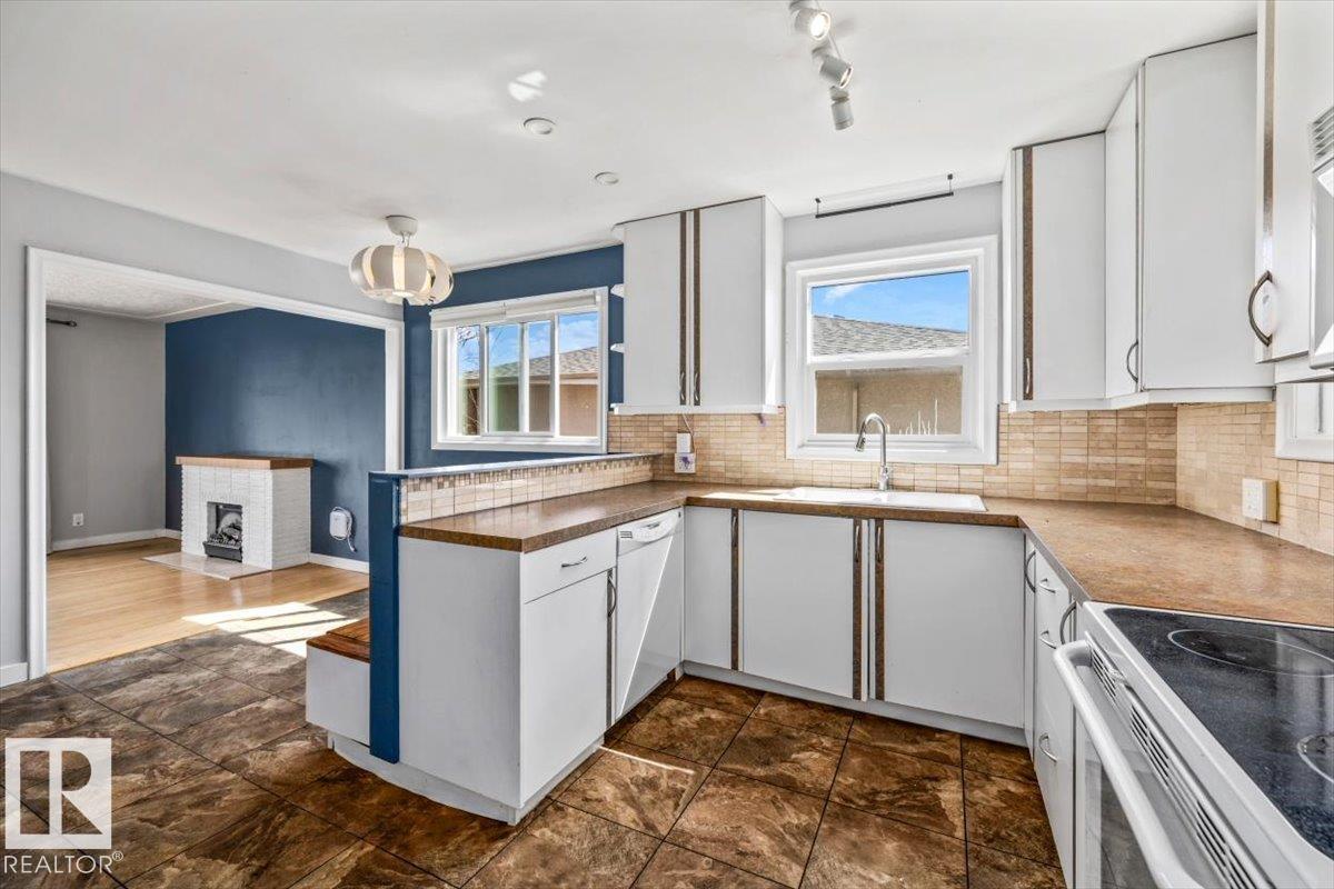 Photo 10 at 9828 79 Street NW, Forest Heights, Edmonton