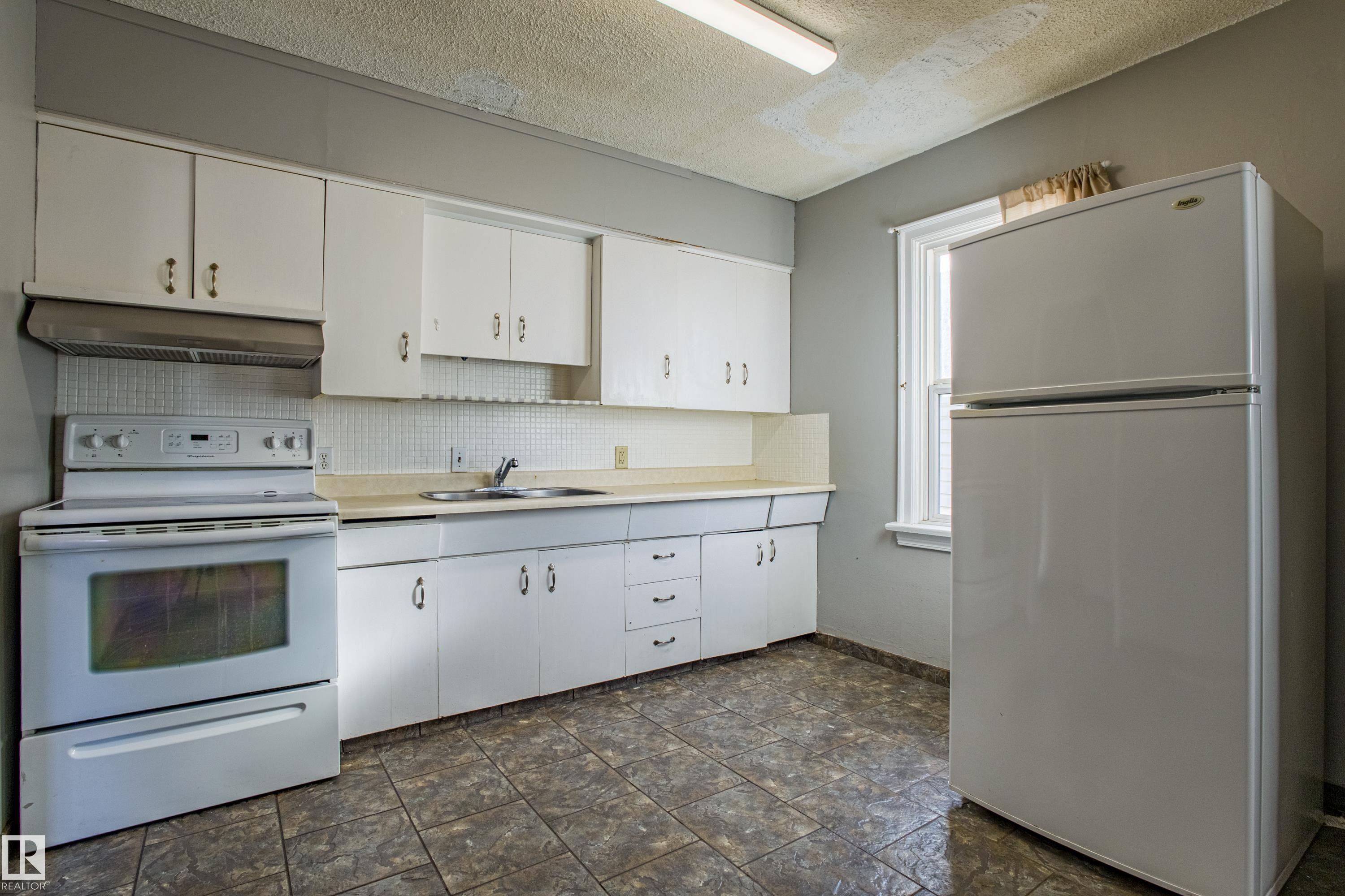 Photo 12 at 12716 12718 94 Street NW, Killarney, Edmonton