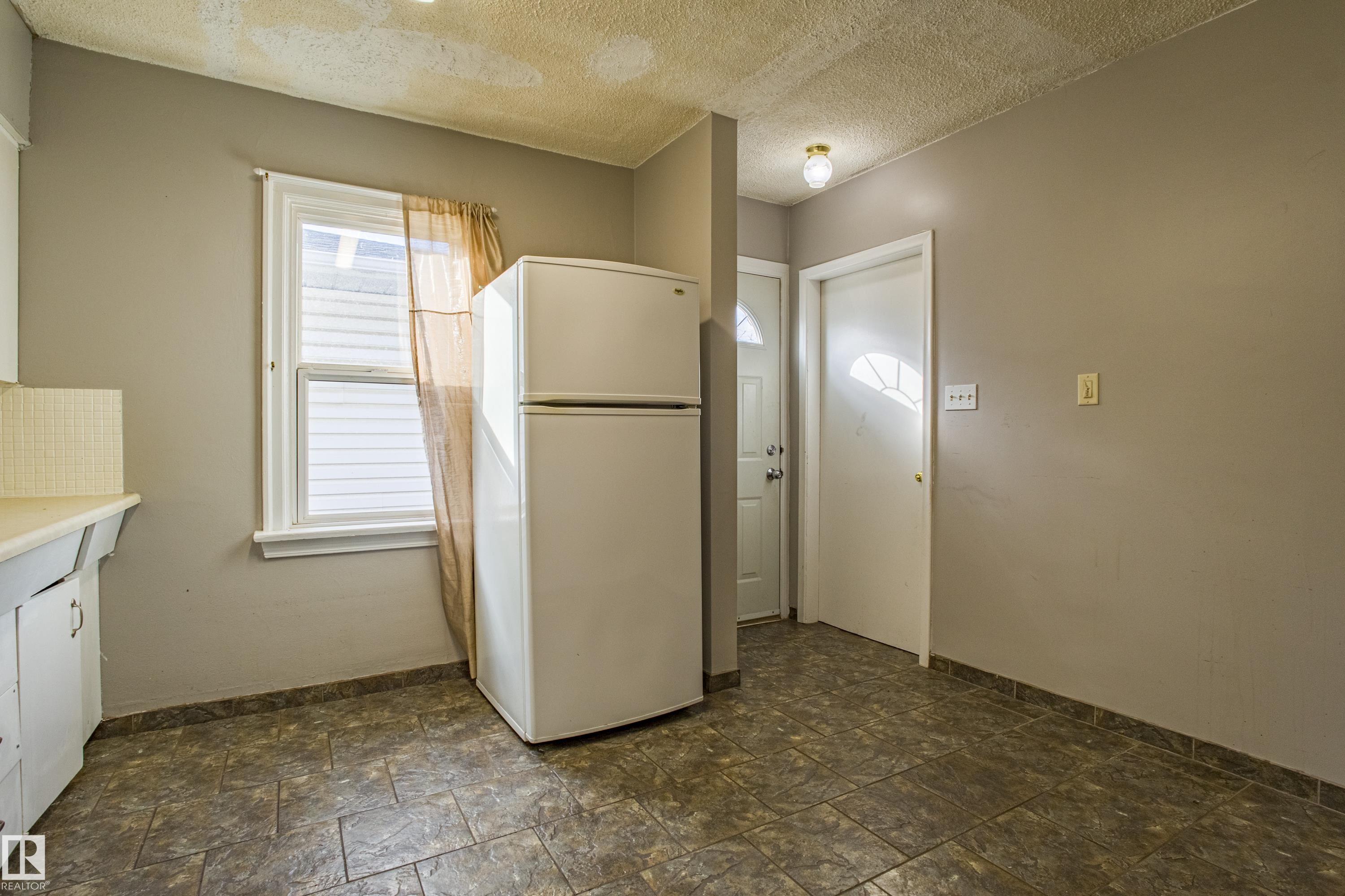 Photo 14 at 12716 12718 94 Street NW, Killarney, Edmonton
