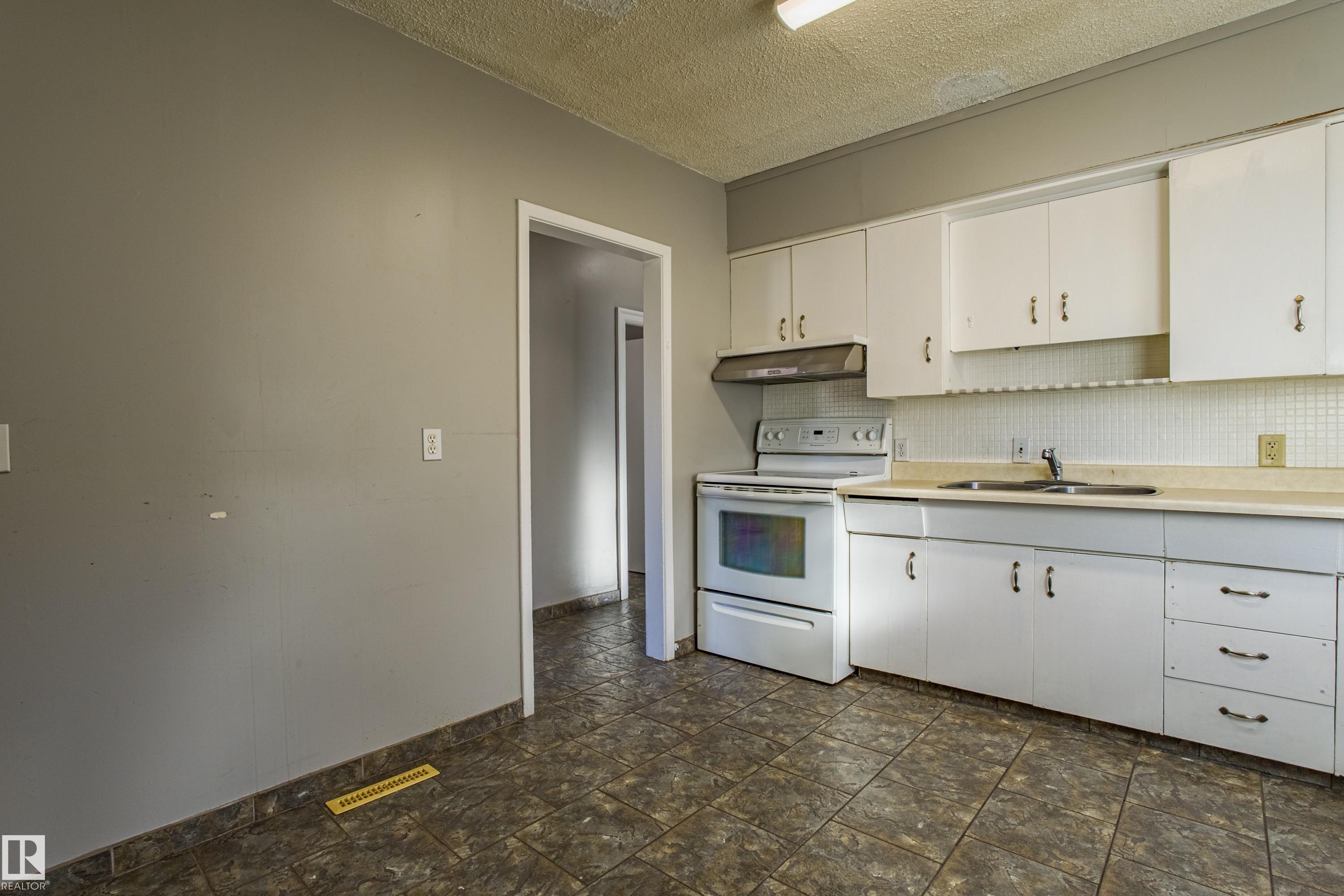 Photo 15 at 12716 12718 94 Street NW, Killarney, Edmonton