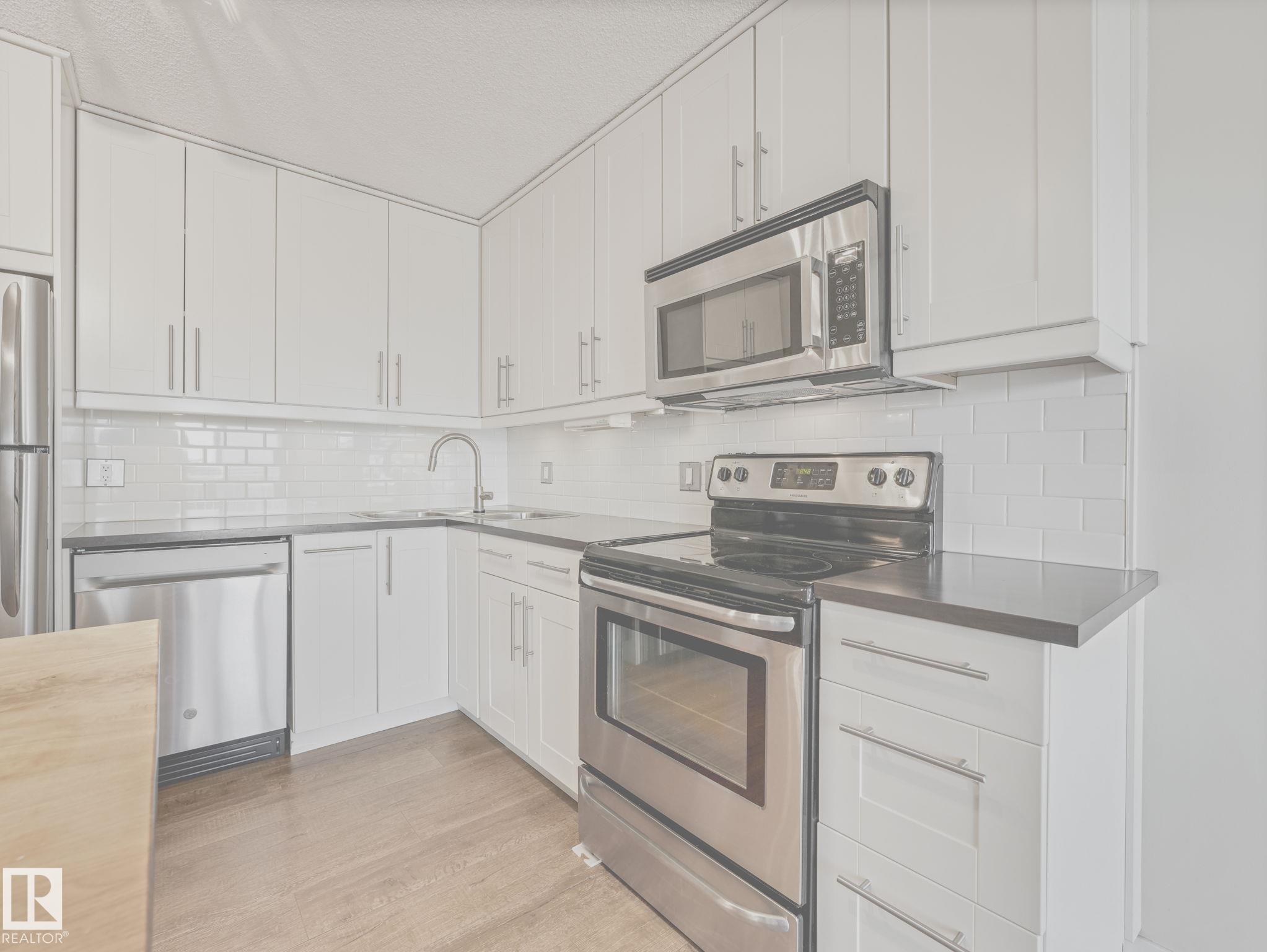 Photo 11 at 1403 - 12141 Jasper Avenue NW, Wîhkwêntôwin, Edmonton