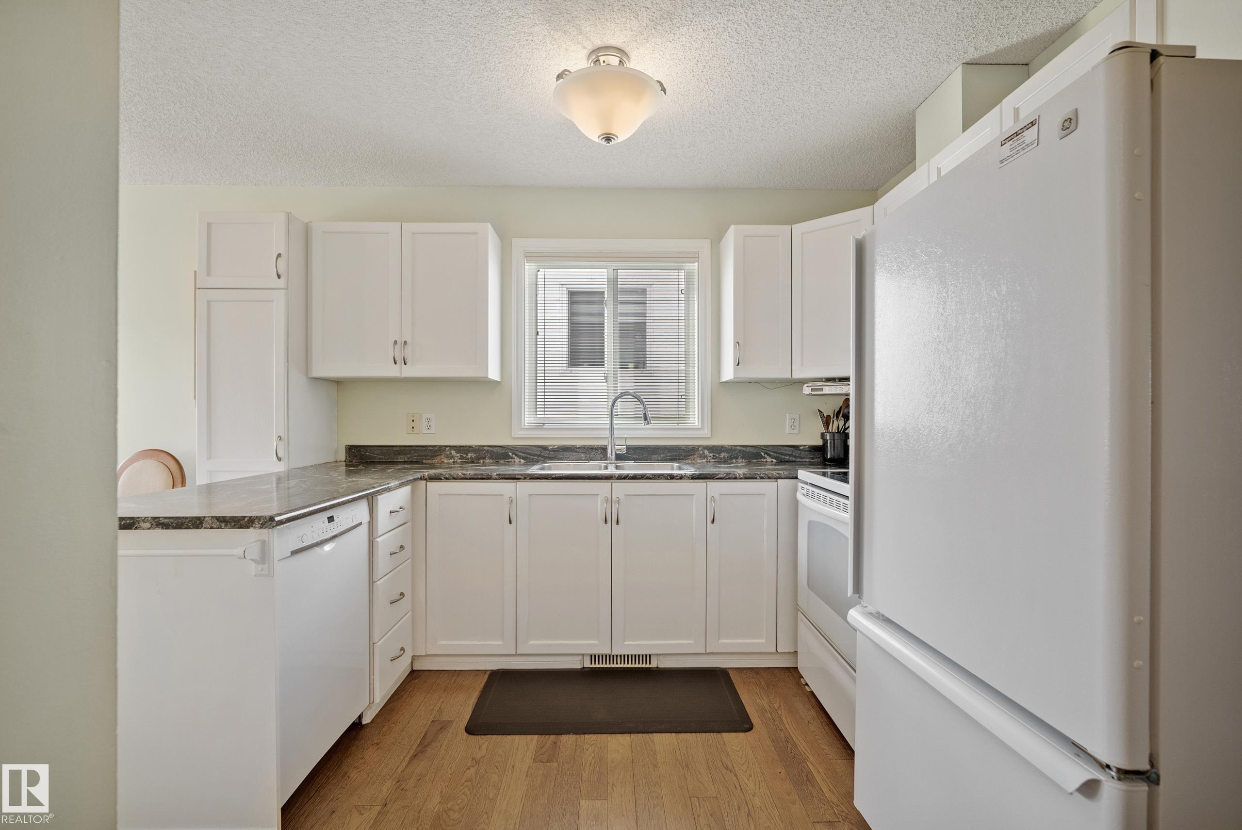 Photo 9 at 4 - 15 Ritchie Way, Regency Park, Sherwood Park