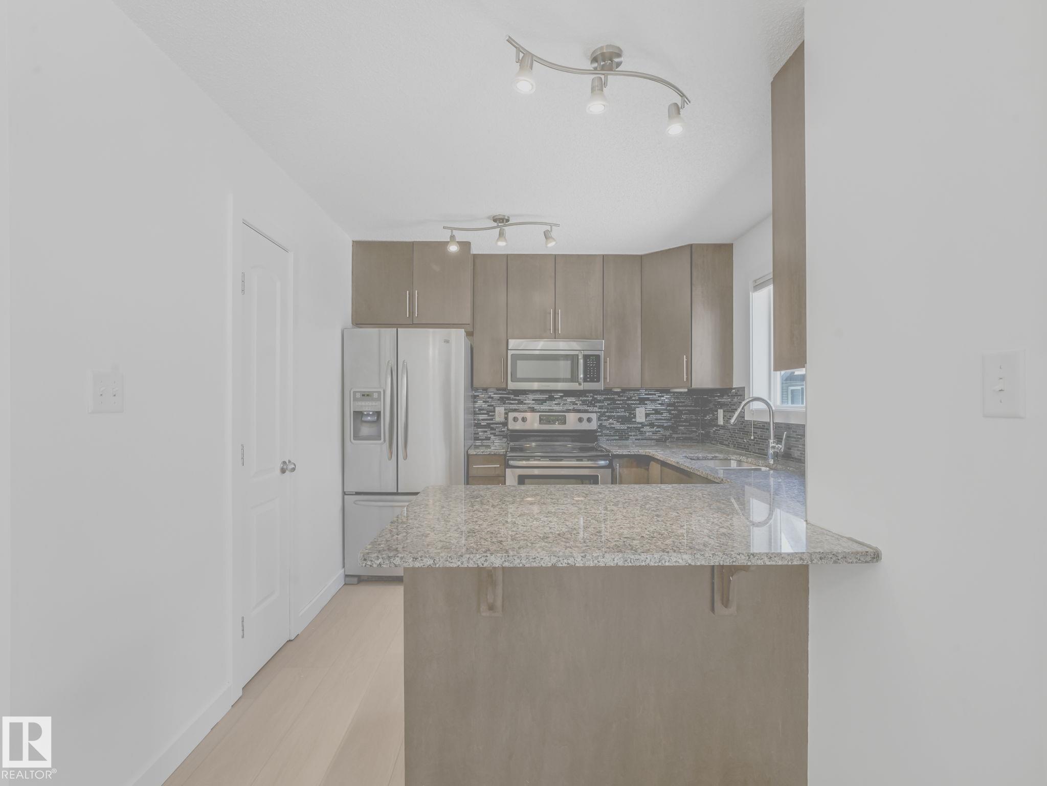 Photo 11 at 49 - 12004 22 Avenue SW, Rutherford, Edmonton