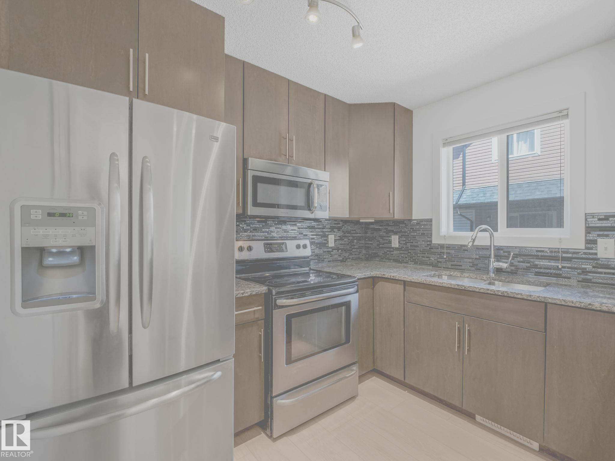Photo 12 at 49 - 12004 22 Avenue SW, Rutherford, Edmonton