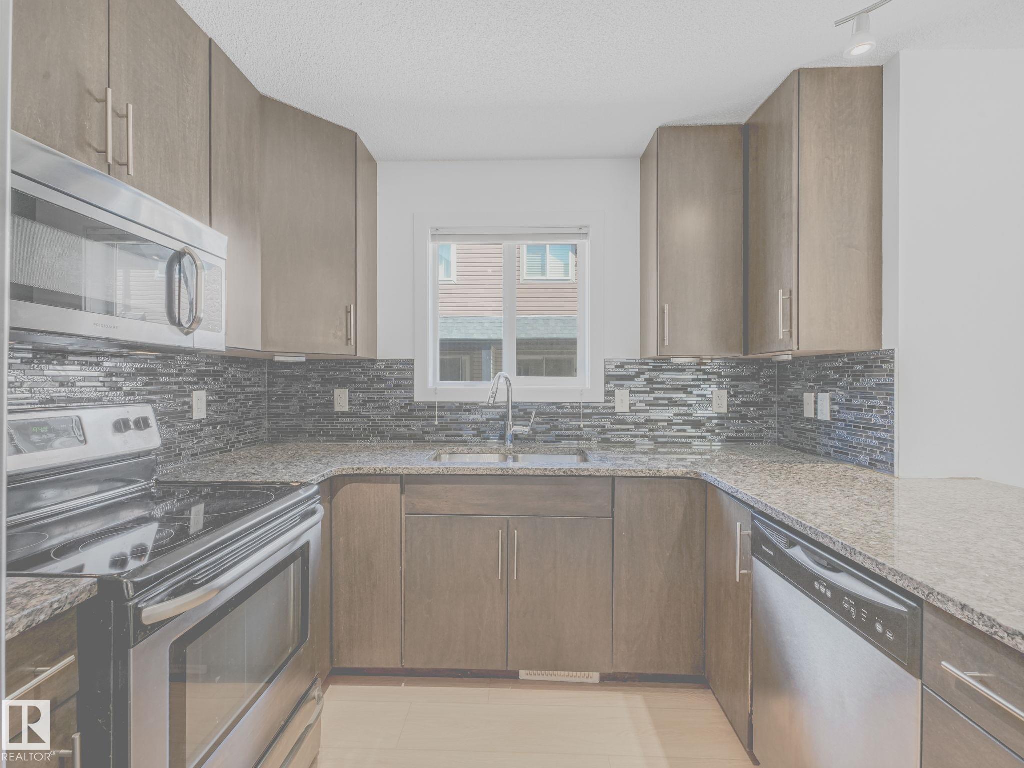 Photo 13 at 49 - 12004 22 Avenue SW, Rutherford, Edmonton