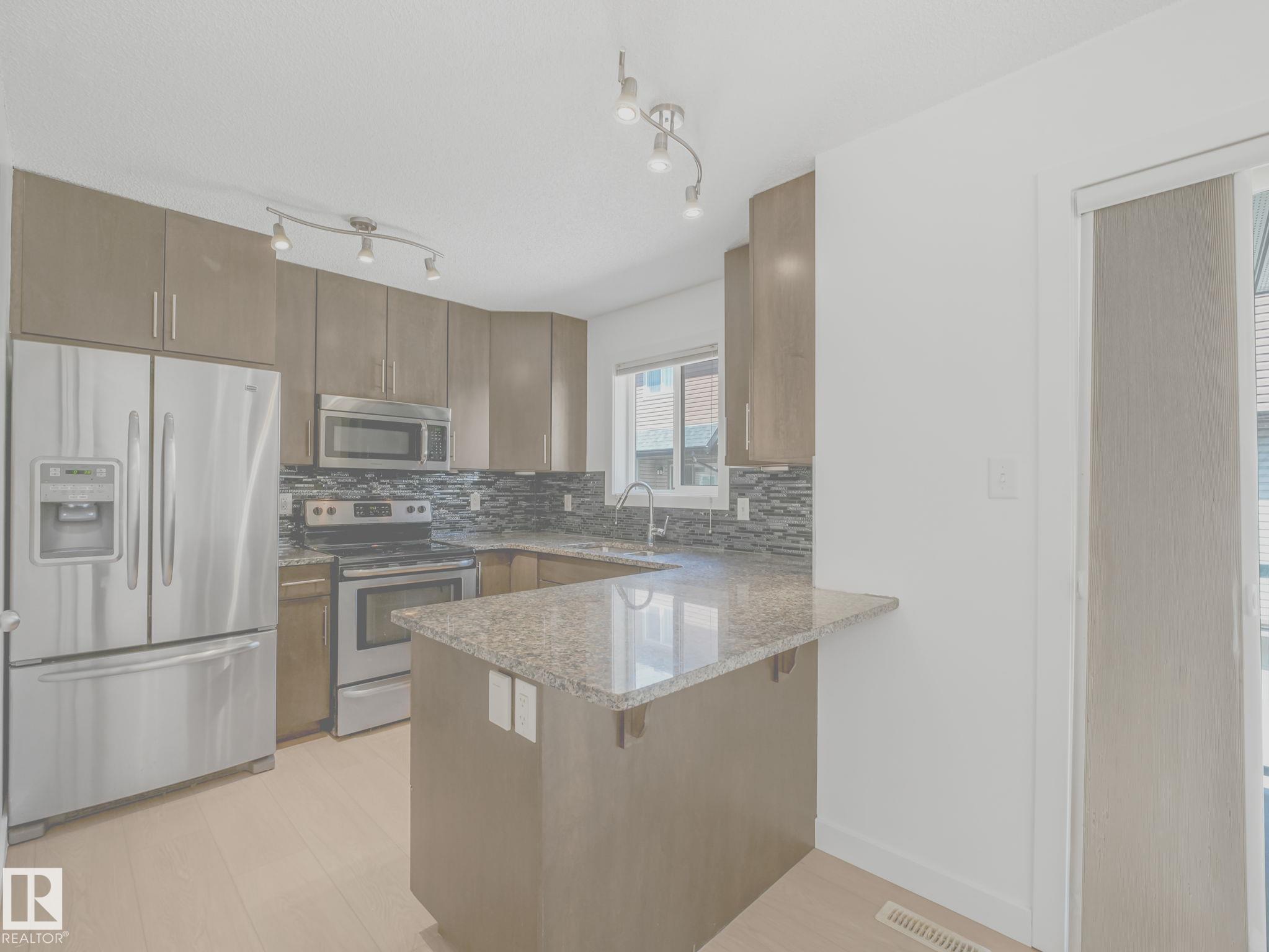 Photo 10 at 49 - 12004 22 Avenue SW, Rutherford, Edmonton