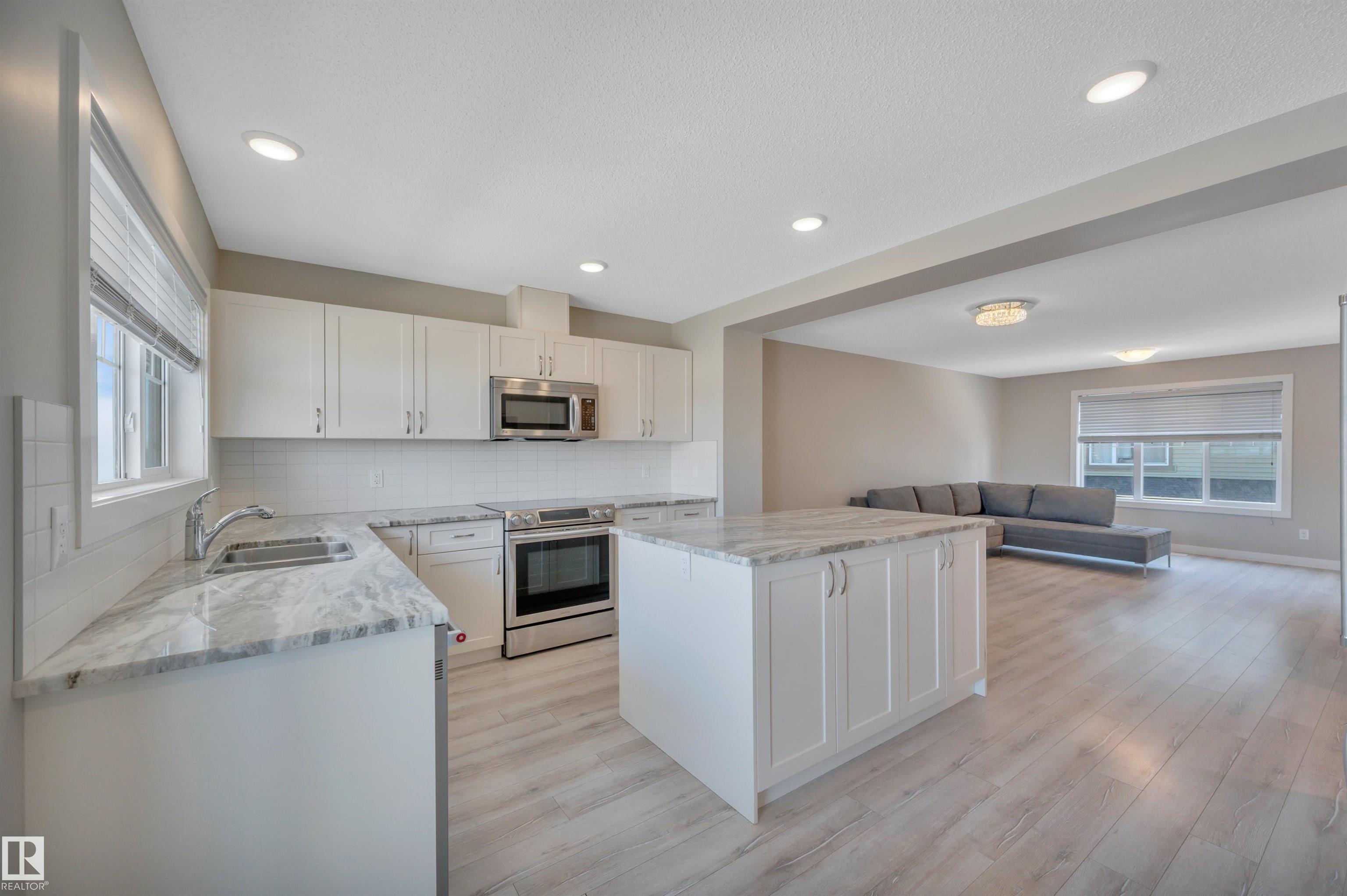 Photo 14 at 8 - 1530 Tamarack Boulevard NW, Tamarack, Edmonton