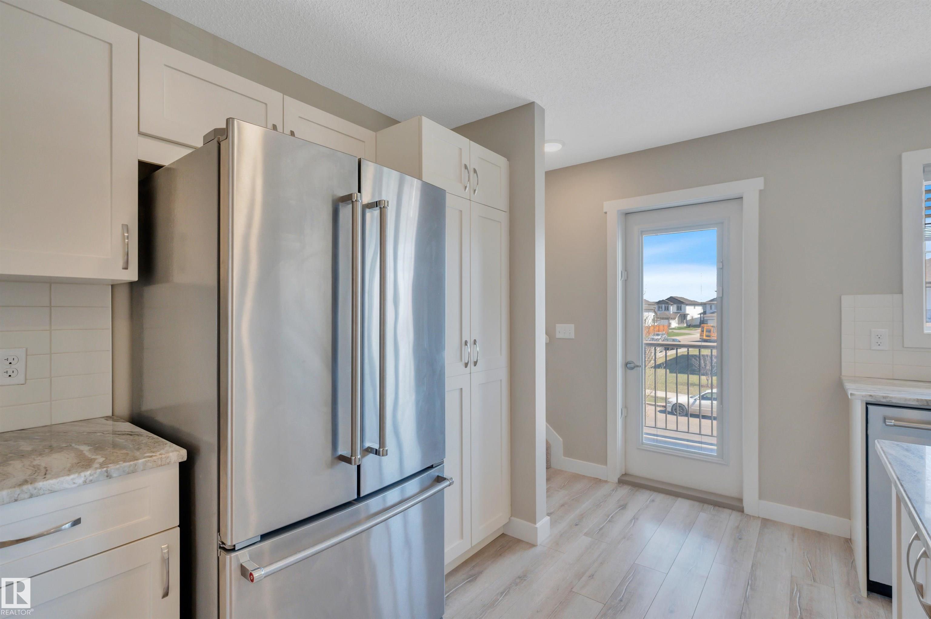 Photo 17 at 8 - 1530 Tamarack Boulevard NW, Tamarack, Edmonton