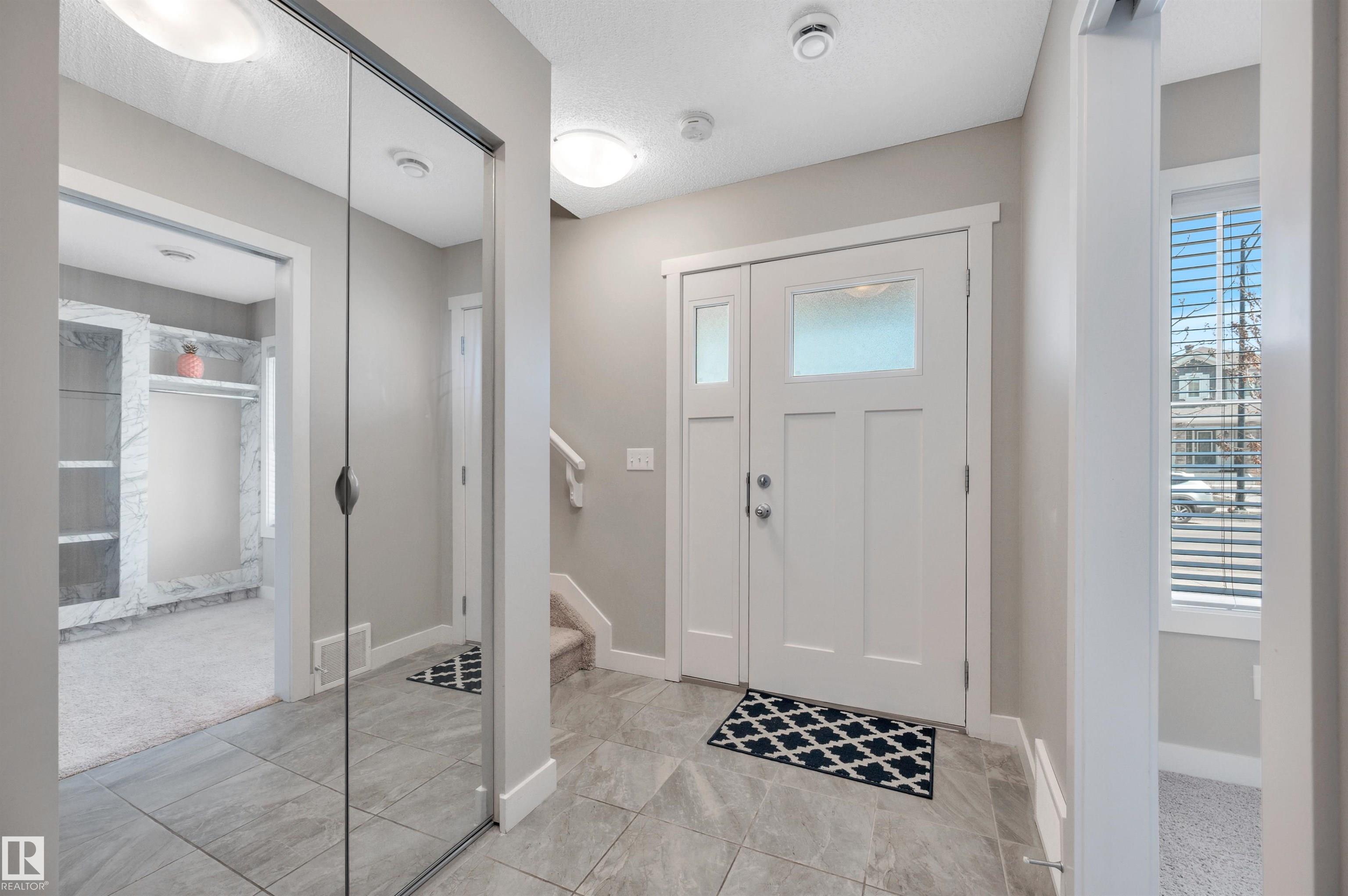 Photo 6 at 8 - 1530 Tamarack Boulevard NW, Tamarack, Edmonton