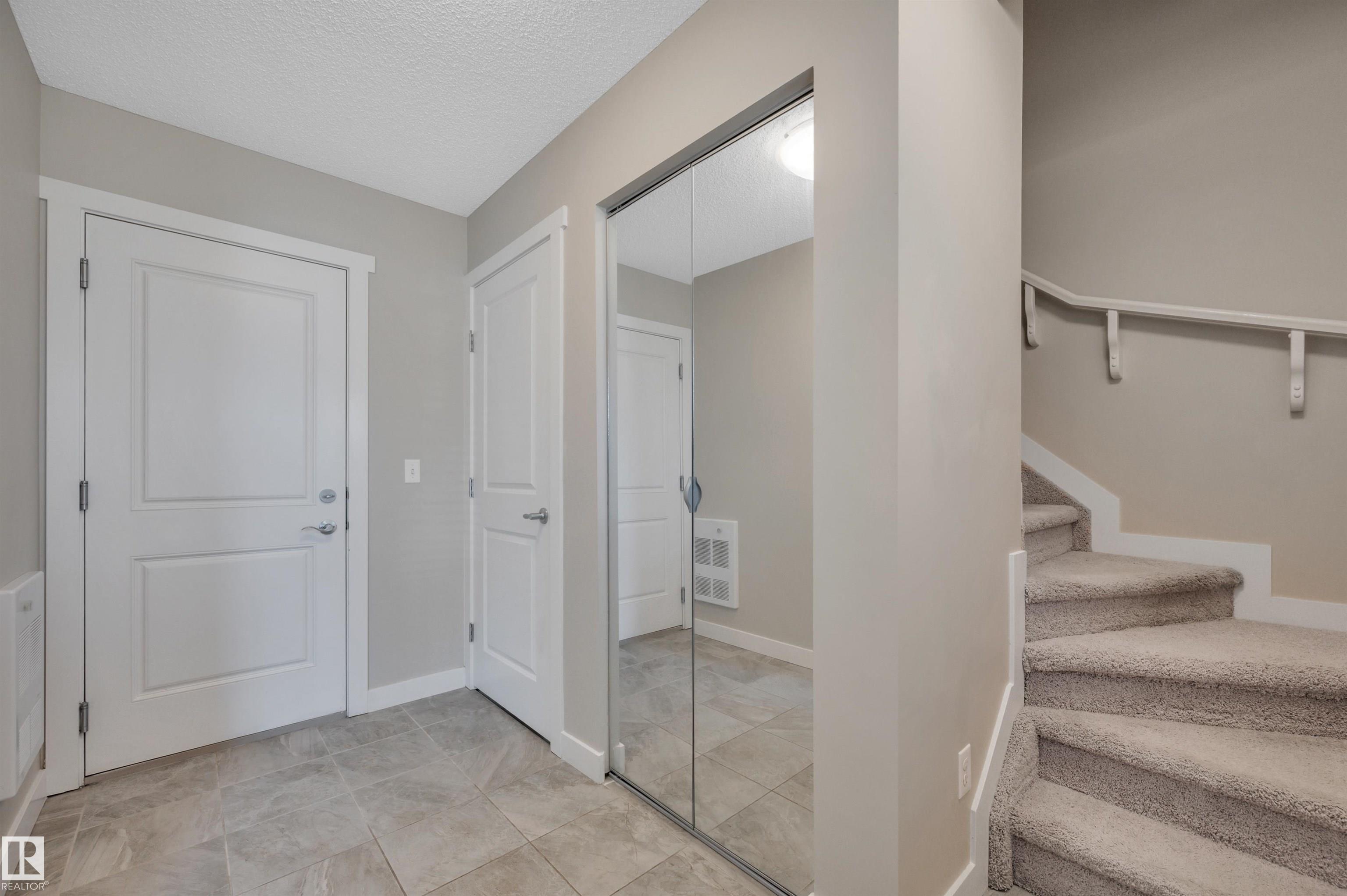 Photo 7 at 8 - 1530 Tamarack Boulevard NW, Tamarack, Edmonton