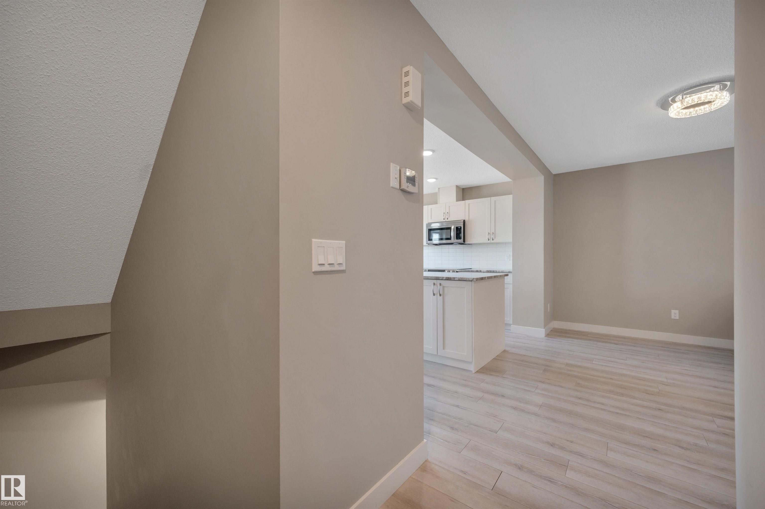 Photo 10 at 8 - 1530 Tamarack Boulevard NW, Tamarack, Edmonton