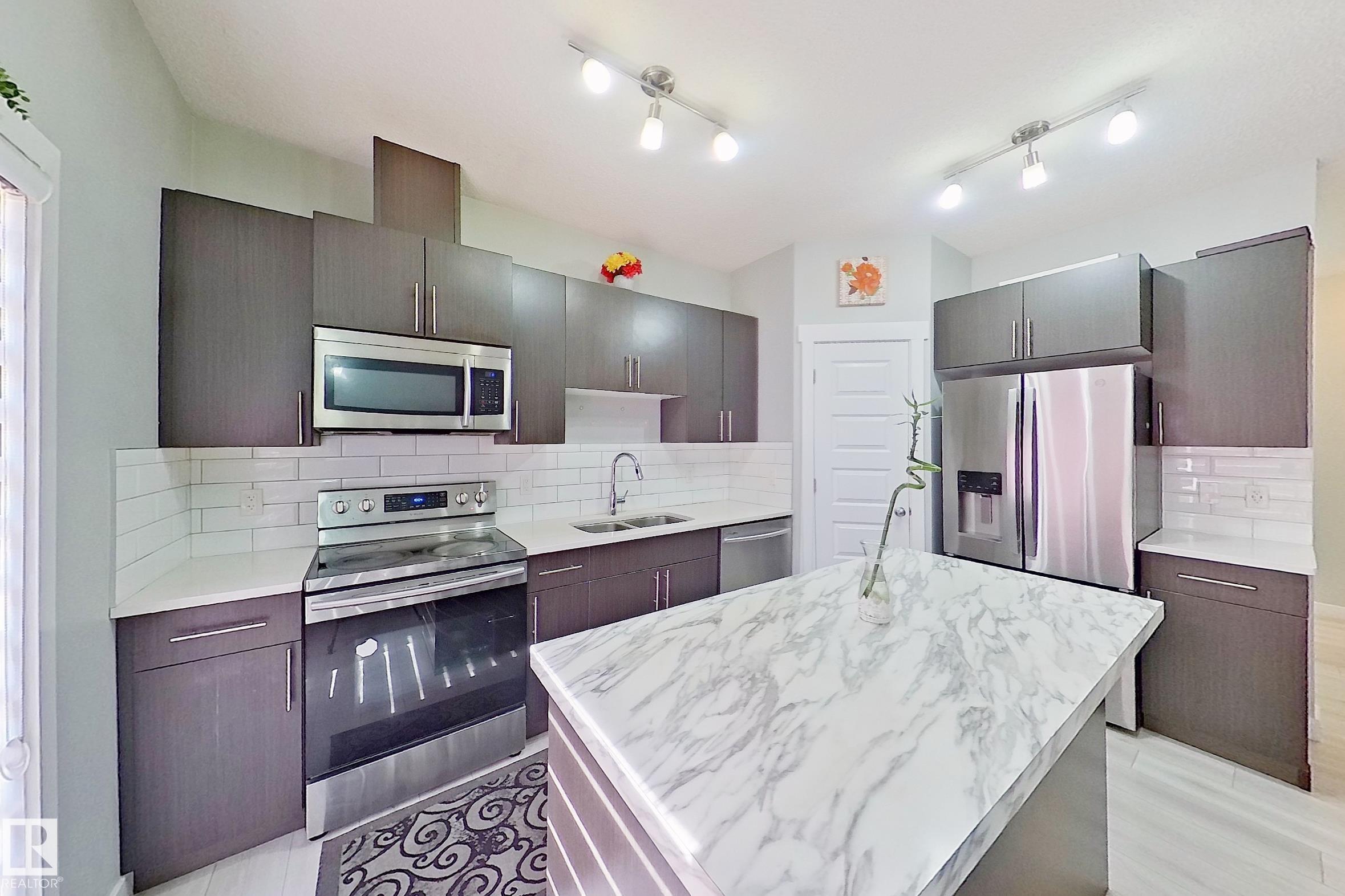 Photo 10 at 1221 27 Street NW, Laurel, Edmonton